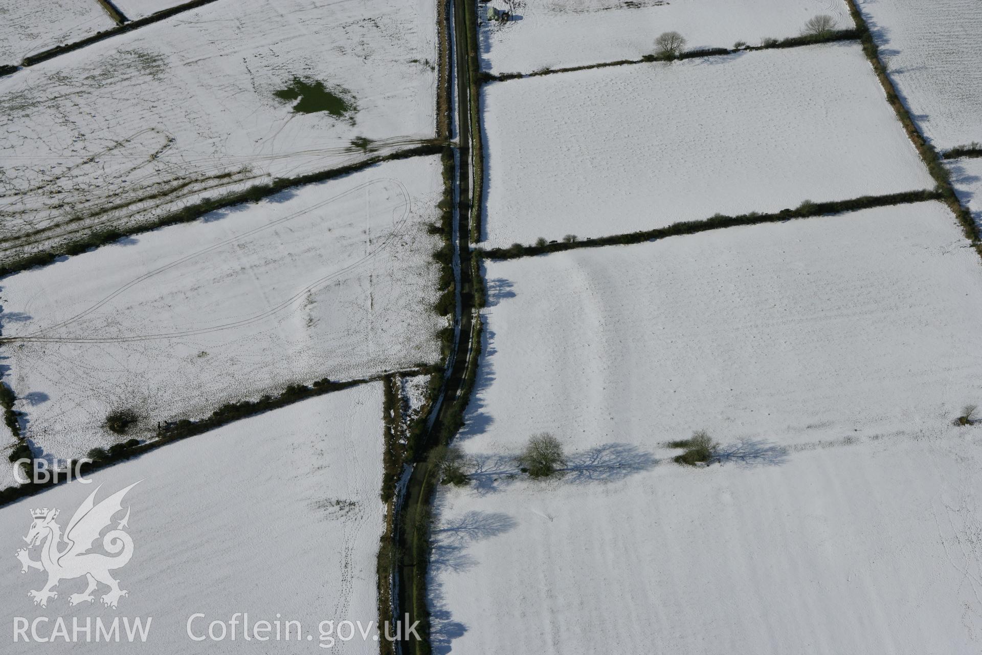 RCAHMW colour oblique photograph of Castell Flemish. Taken by Toby Driver on 06/02/2009.