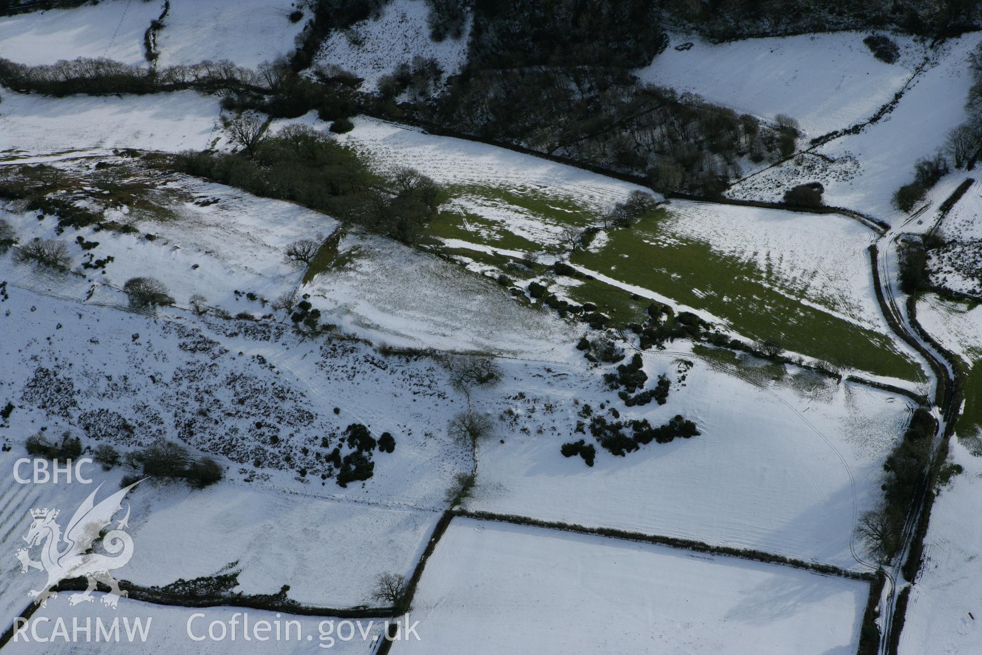 RCAHMW colour oblique photograph of Llwyndu Camp. Taken by Toby Driver on 06/02/2009.