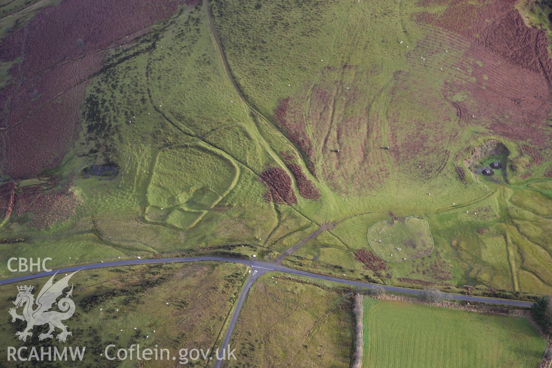 RCAHMW colour oblique aerial photograph of Moelfre Hill Deserted Rural Settlement. Taken on 10 December 2009 by Toby Driver