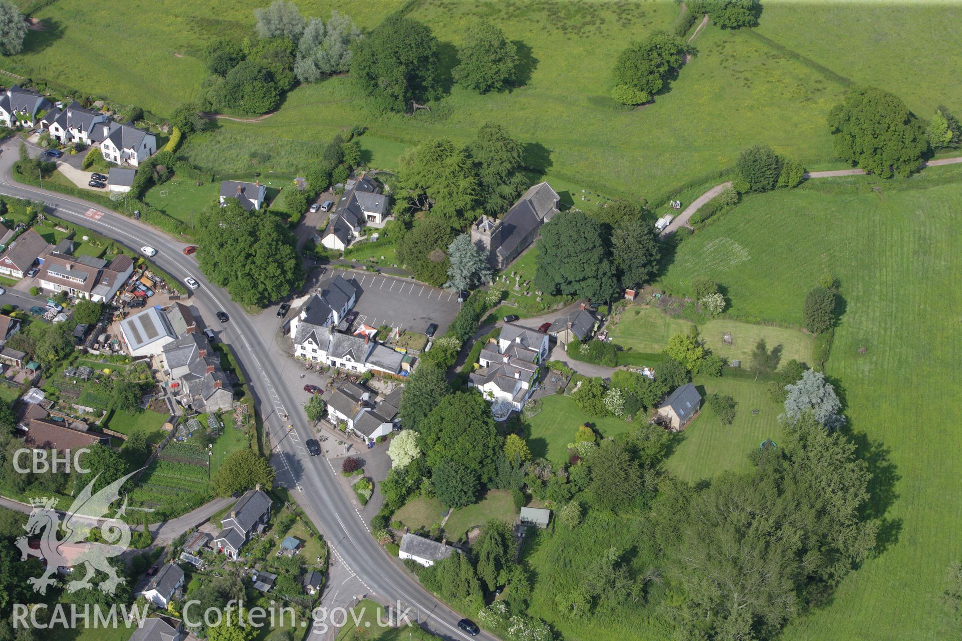 RCAHMW colour oblique aerial photograph of St Cybi's Church, Llangybi. Taken on 11 June 2009 by Toby Driver