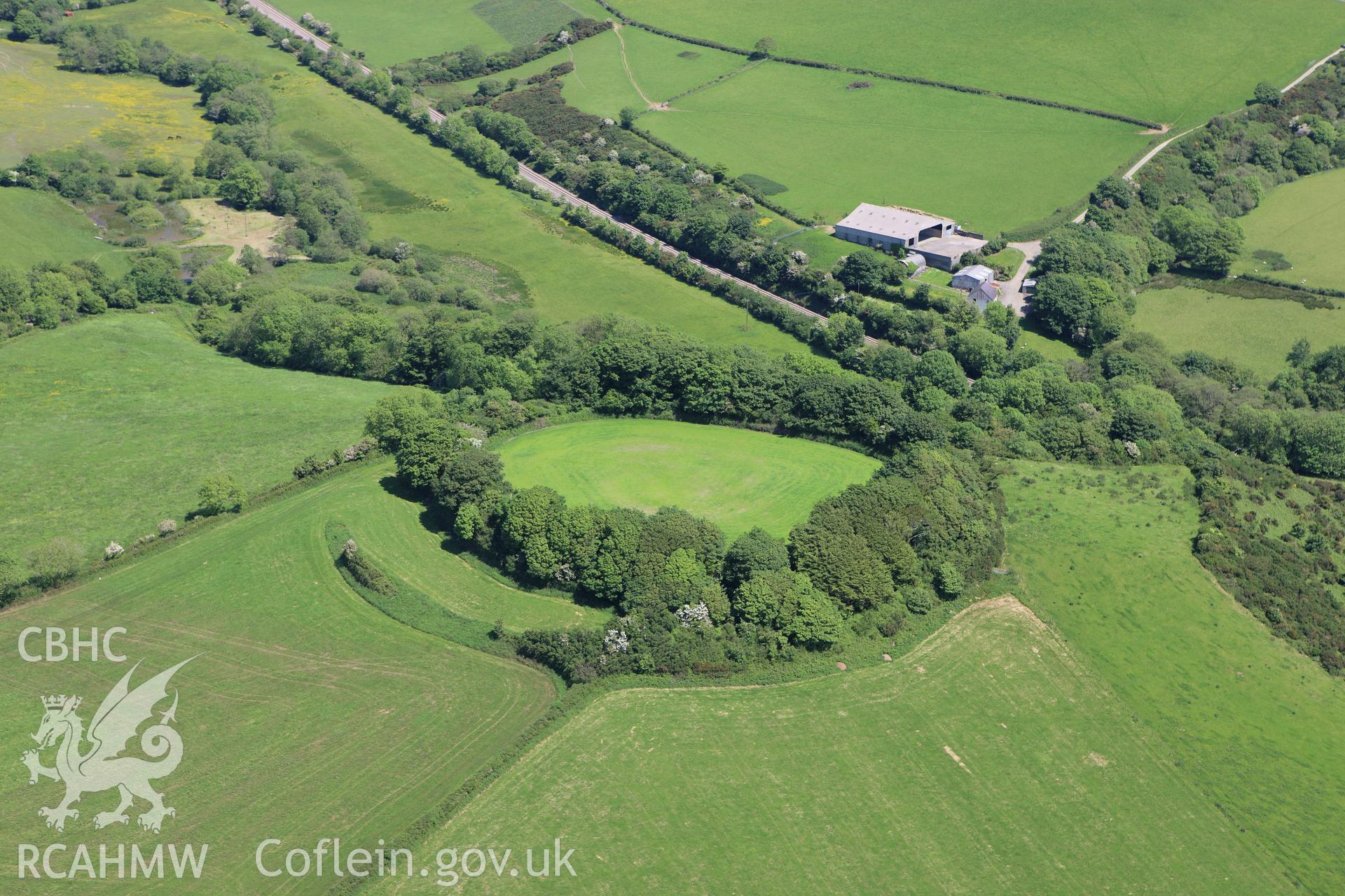 RCAHMW colour oblique aerial photograph of Rudbaxton (Crundale) Rath. Taken on 01 June 2009 by Toby Driver