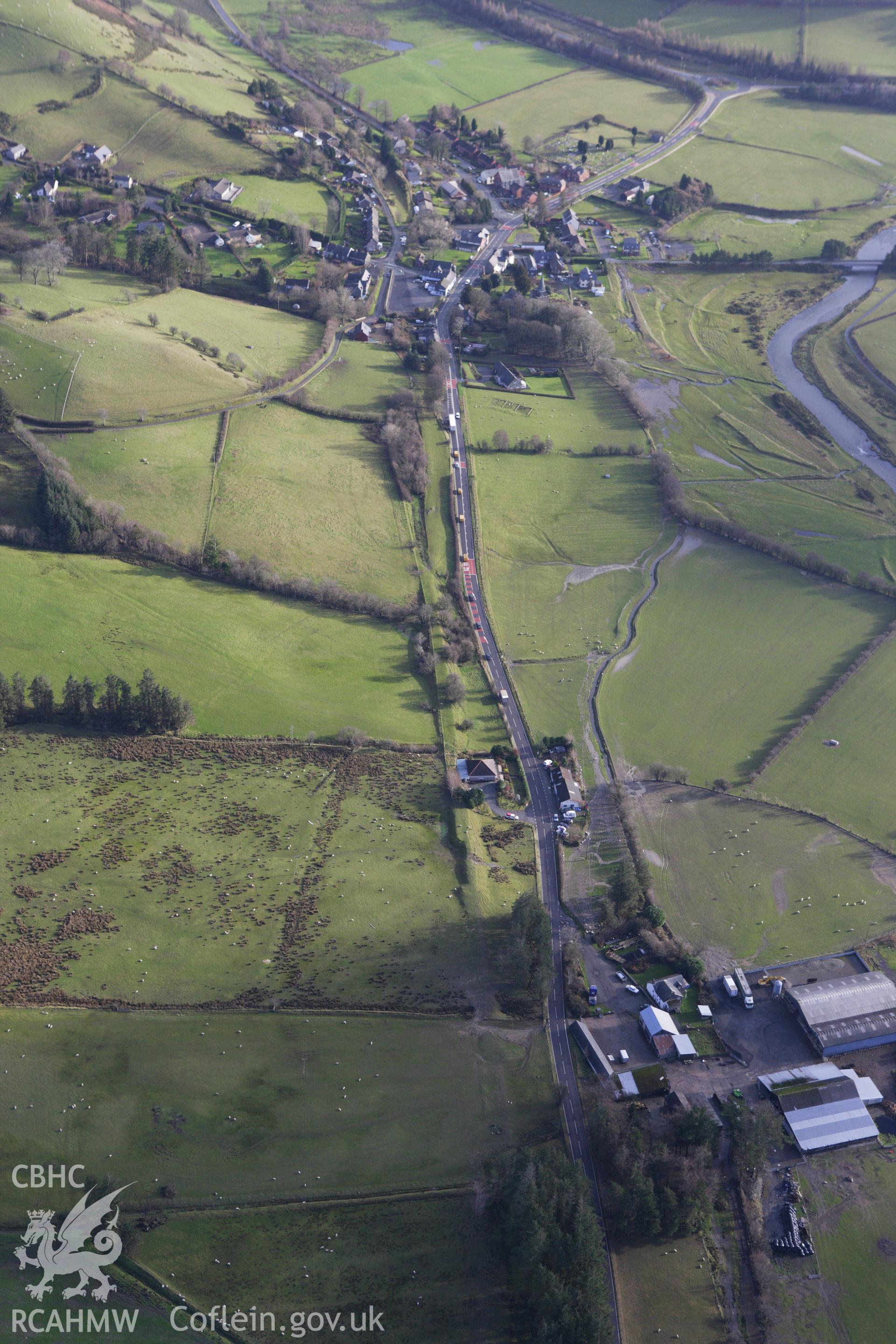 RCAHMW colour oblique aerial photograph of a section of the dismantled Manchester and Milford Railway between Llangurig and Llanidloes west of Llangurig. Taken on 10 December 2009 by Toby Driver