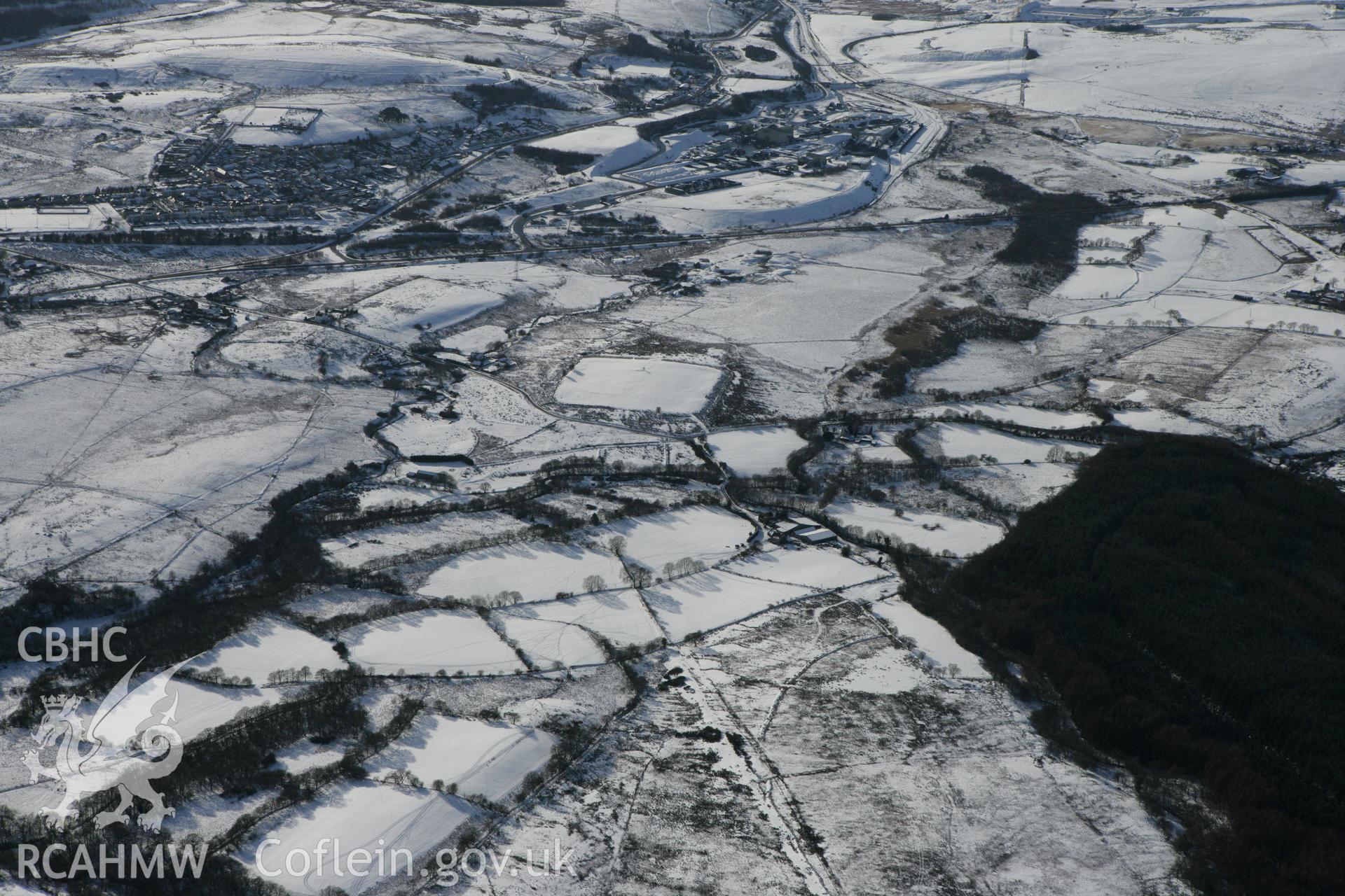 RCAHMW colour oblique photograph of Coelbren Roman fort. Taken by Toby Driver on 06/02/2009.