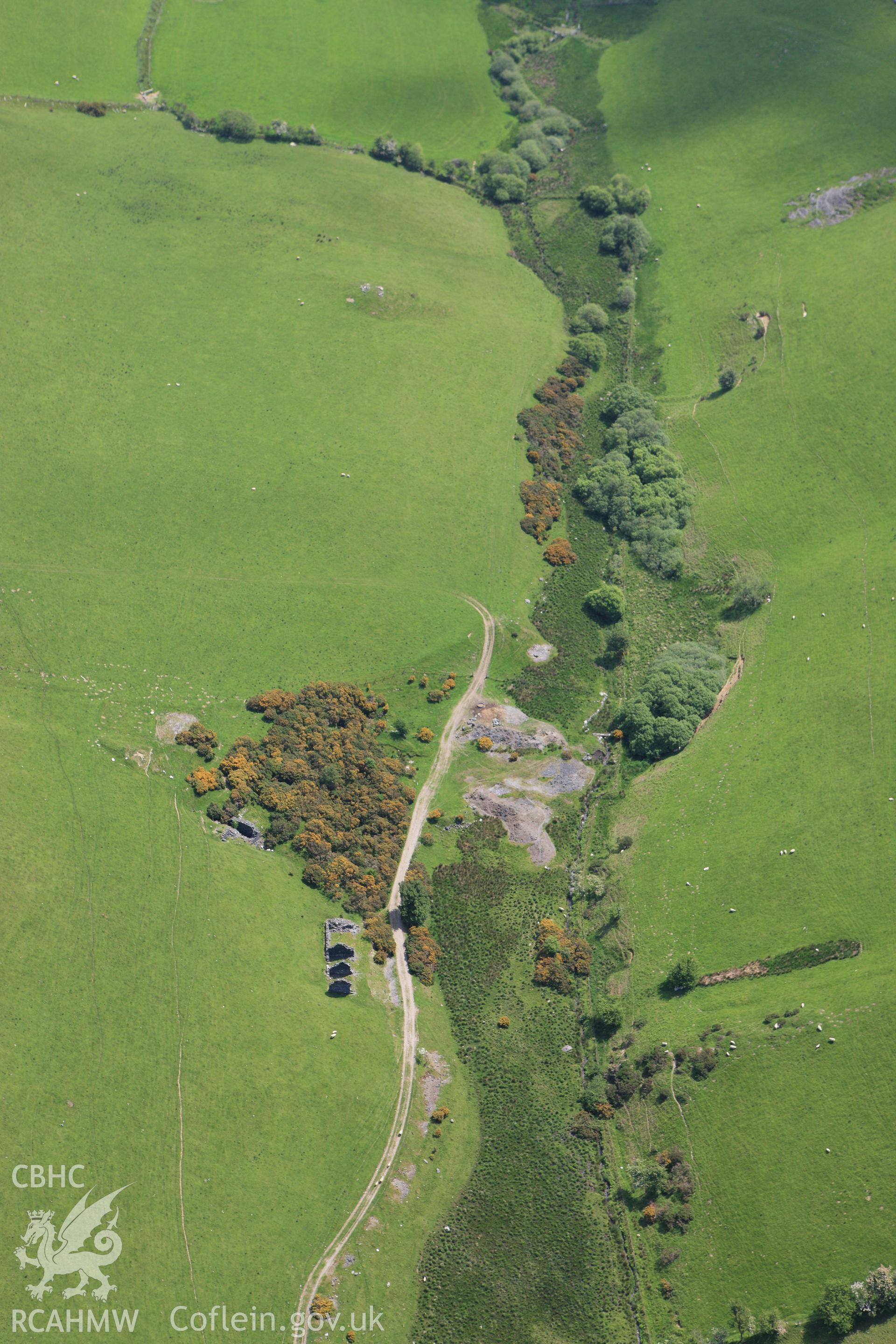 RCAHMW colour oblique aerial photograph of Mynydd Gorddu Lead Mine. Taken on 02 June 2009 by Toby Driver