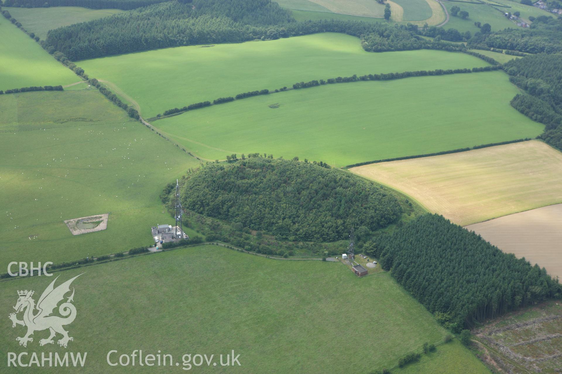 RCAHMW colour oblique aerial photograph of Beacon Ring (Caer Digoll). Taken on 29 June 2009 by Toby Driver