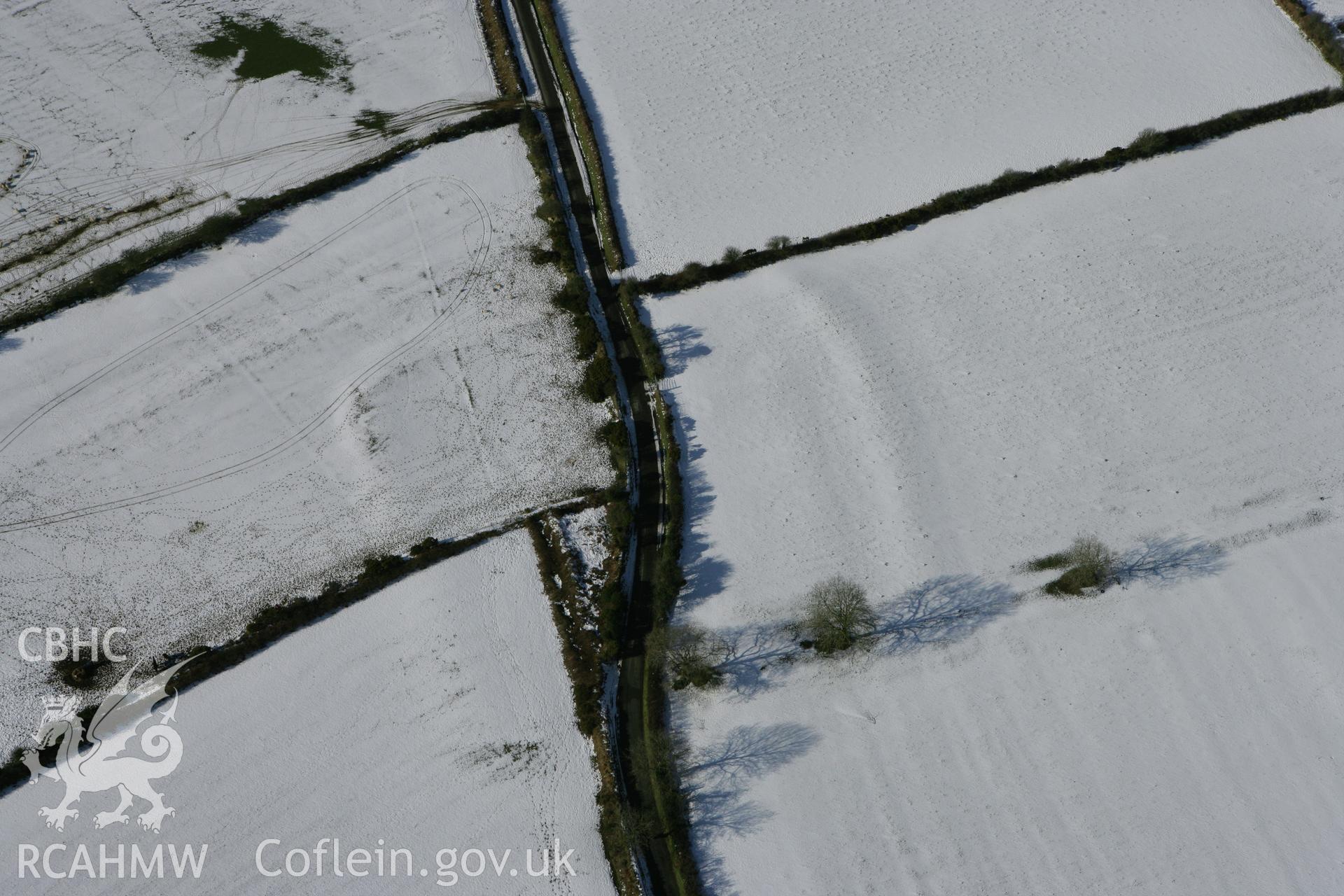 RCAHMW colour oblique photograph of Castell Flemish. Taken by Toby Driver on 06/02/2009.