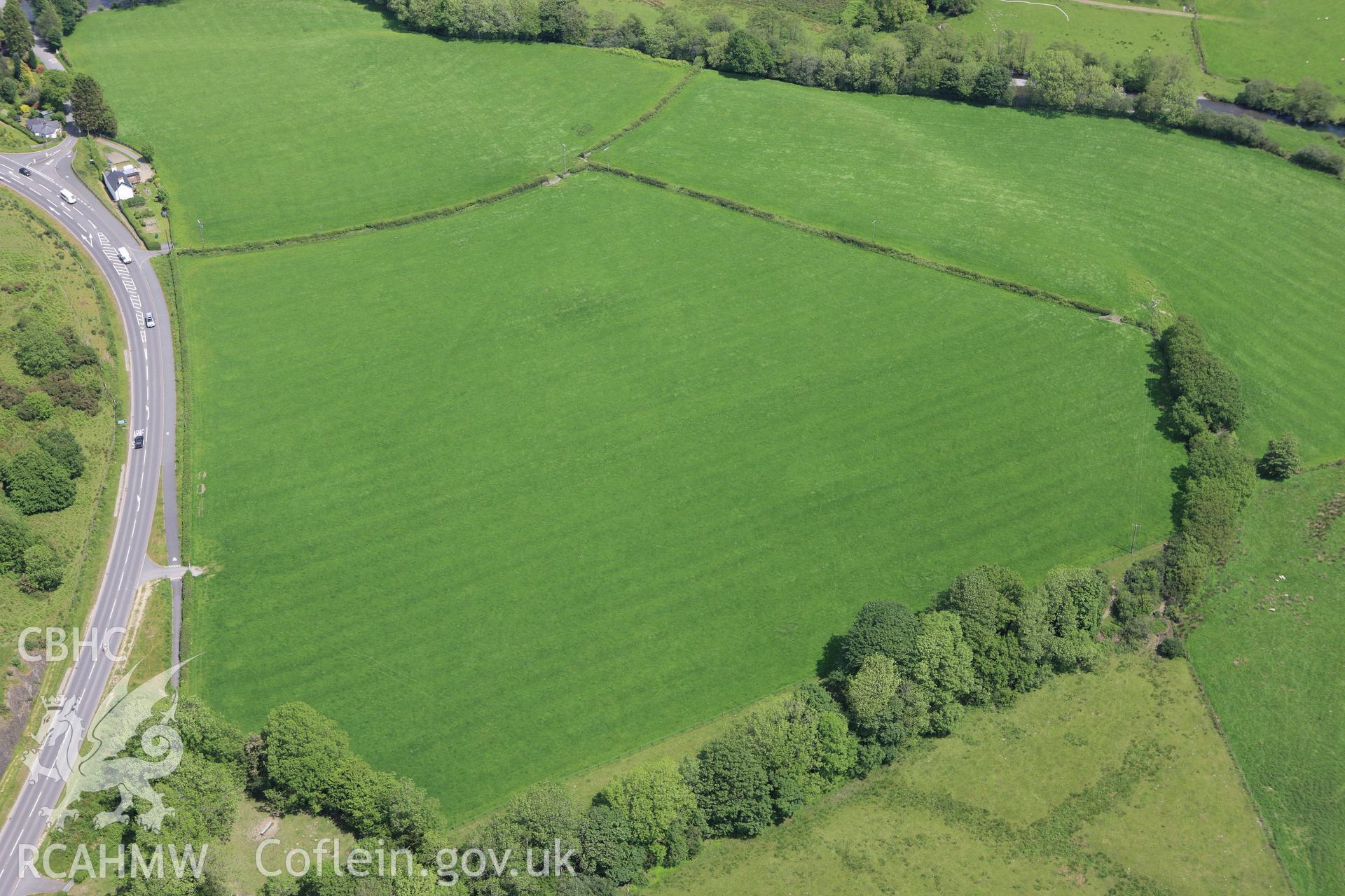 RCAHMW colour oblique aerial photograph of Fridd Round Barrows, Afon Dulas. Taken on 02 June 2009 by Toby Driver