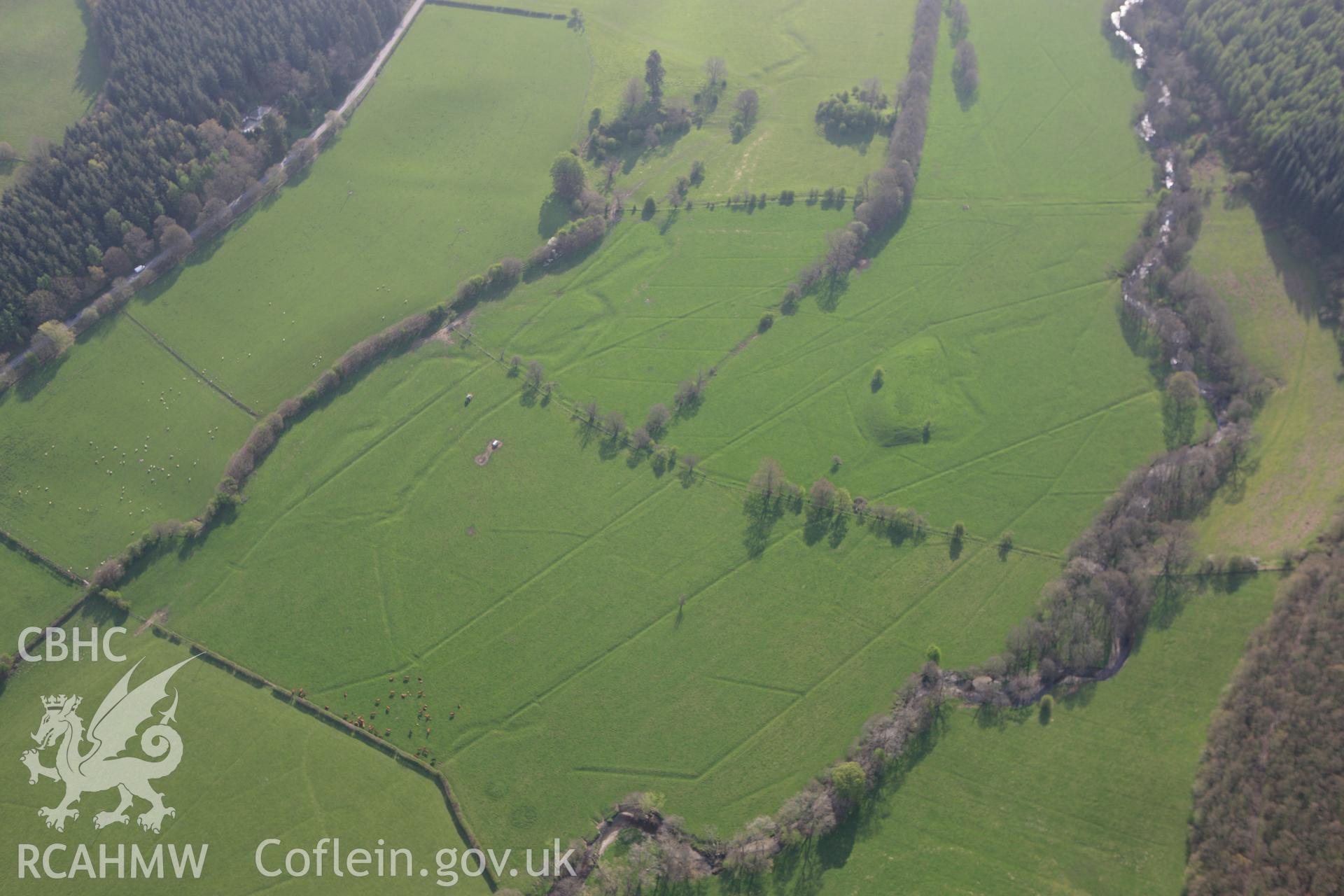 RCAHMW colour oblique aerial photograph of Cuckoo Pen Mounds. Taken on 21 April 2009 by Toby Driver