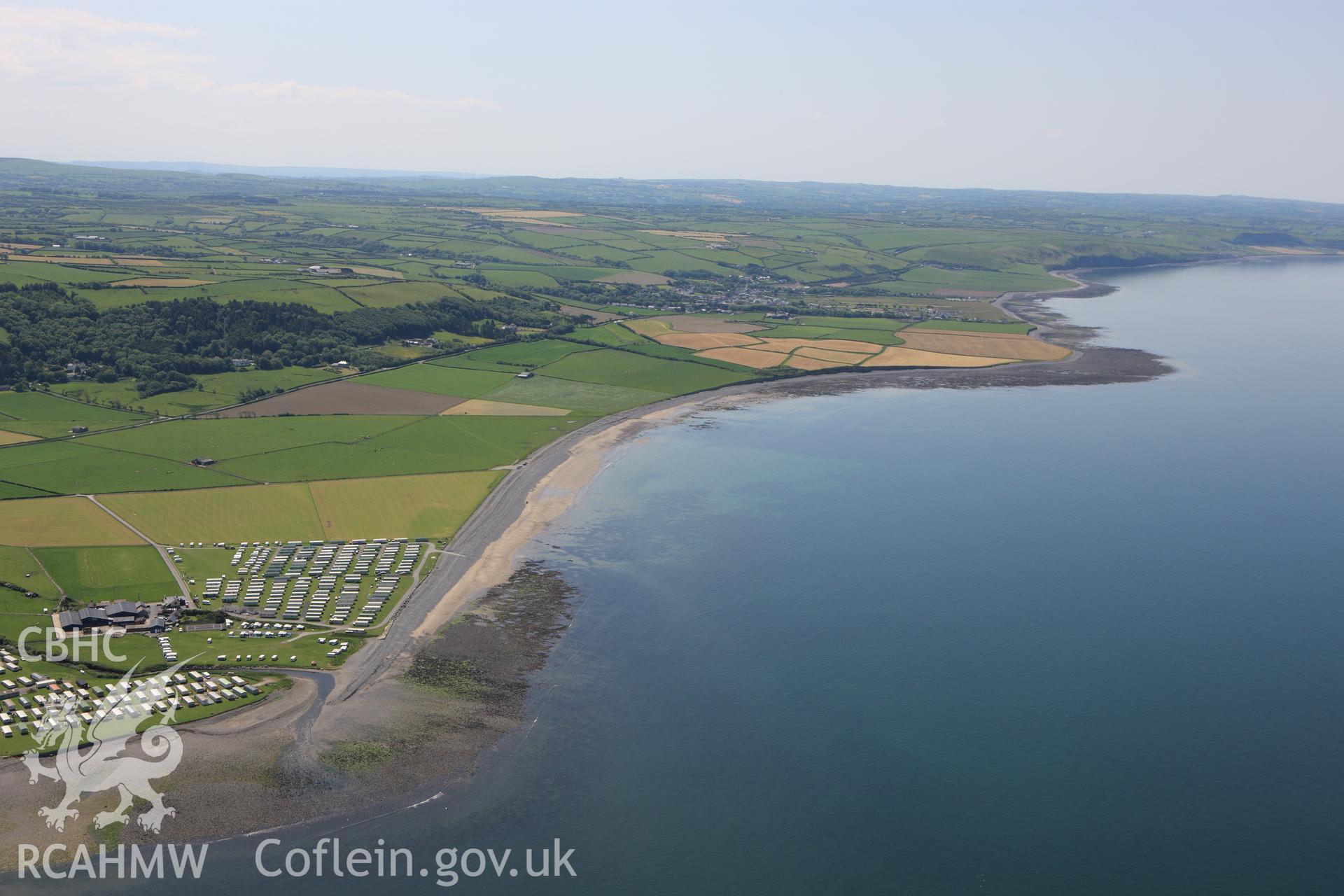 RCAHMW colour oblique aerial photograph of possible fish traps or submerged structures at Llanrhystud. Taken on 02 June 2009 by Toby Driver