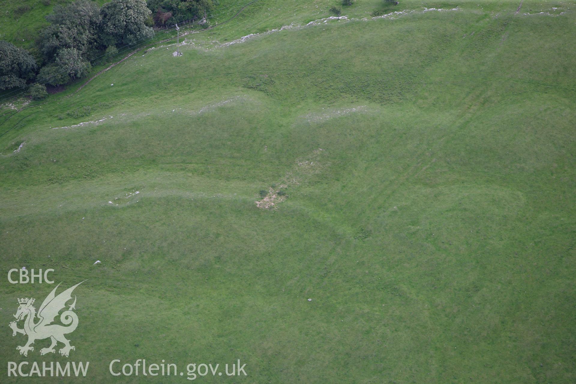 RCAHMW colour oblique aerial photograph of showing enclosure at Marian Ffrith. Taken on 30 July 2009 by Toby Driver