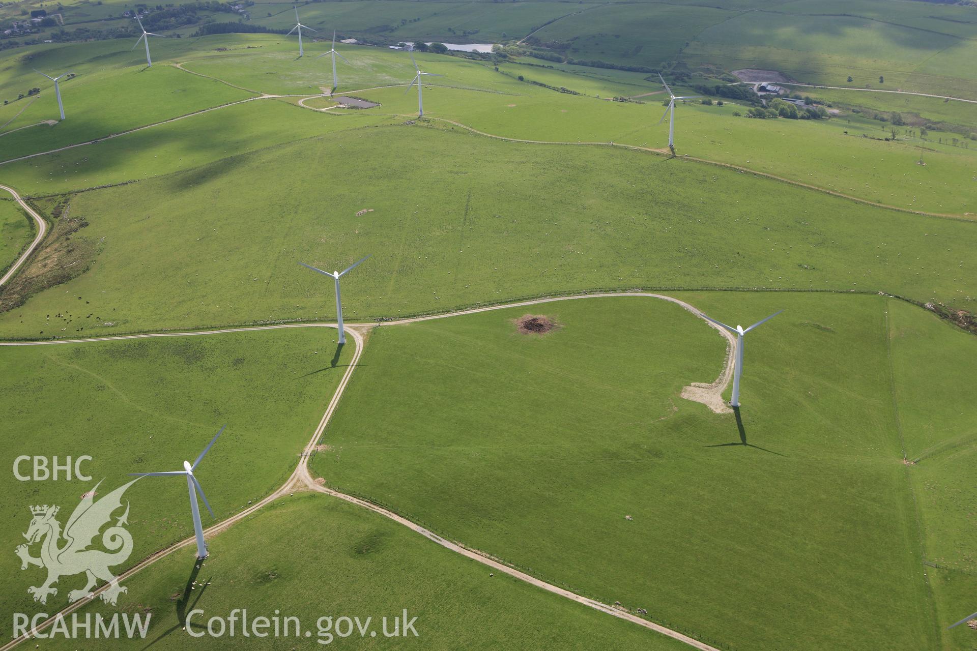 RCAHMW colour oblique aerial photograph of Mynydd Gorddu Wind Farm, Elerch, Tal-y-Bont. Taken on 02 June 2009 by Toby Driver