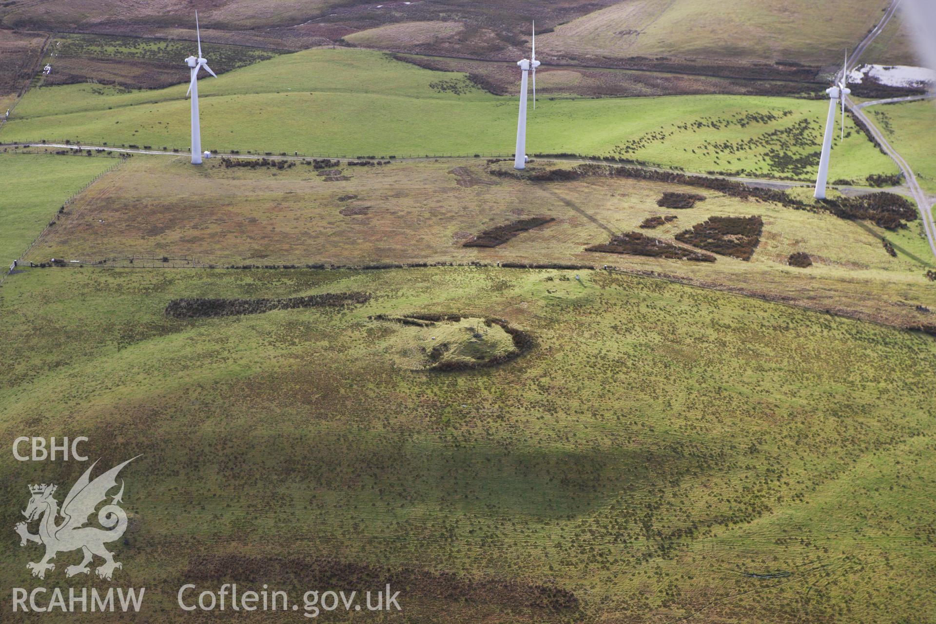 RCAHMW colour oblique aerial photograph of Pegwyn Mawr Cairn I. Taken on 10 December 2009 by Toby Driver