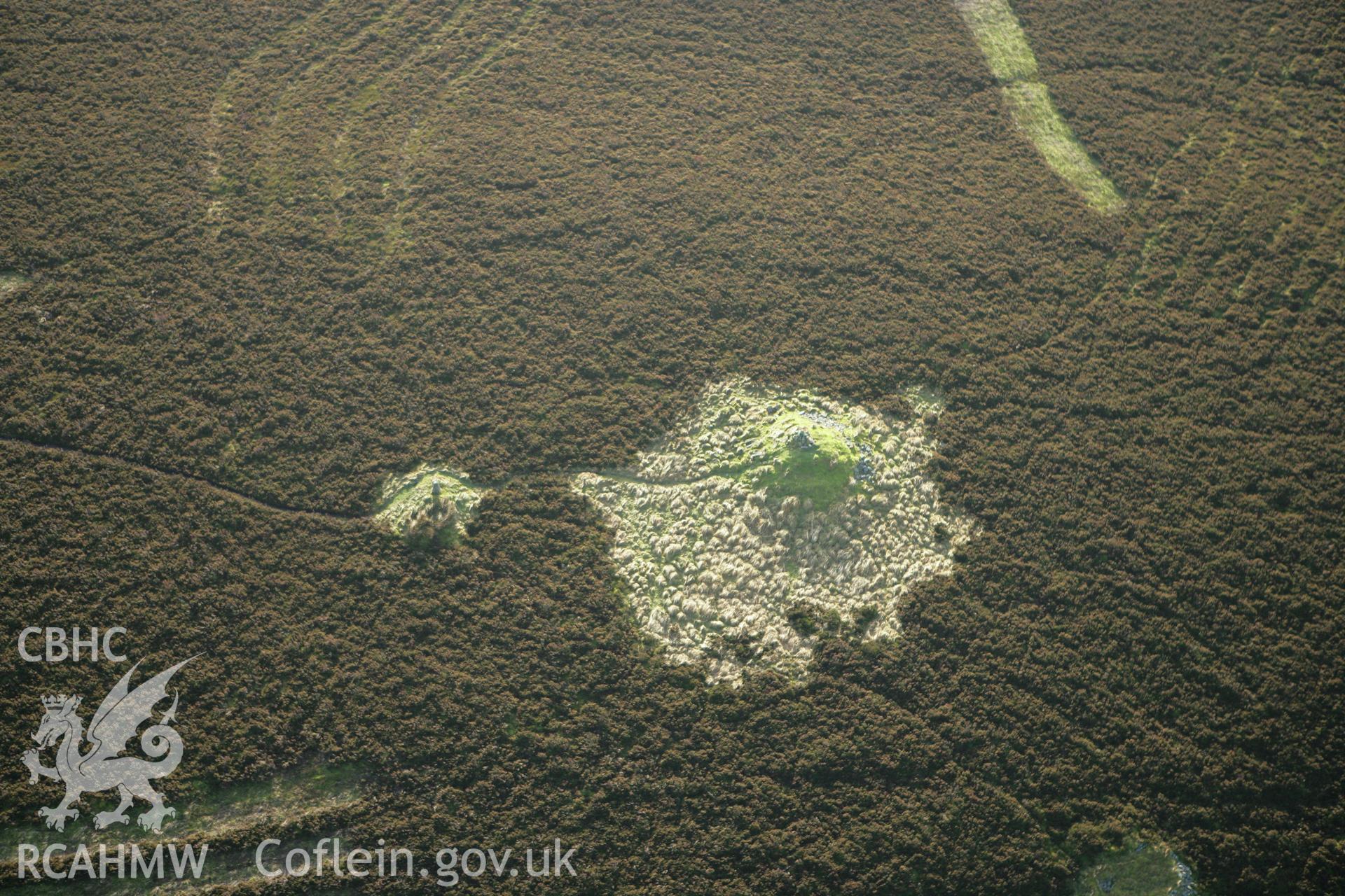 RCAHMW colour oblique aerial photograph of Sir Watkin's Tower, Cairns I and II. Taken on 10 December 2009 by Toby Driver