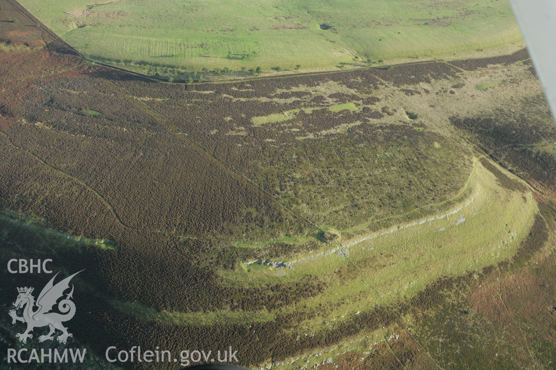 RCAHMW colour oblique aerial photograph of Creigiau Eglwyseg Mound I. Taken on 10 December 2009 by Toby Driver