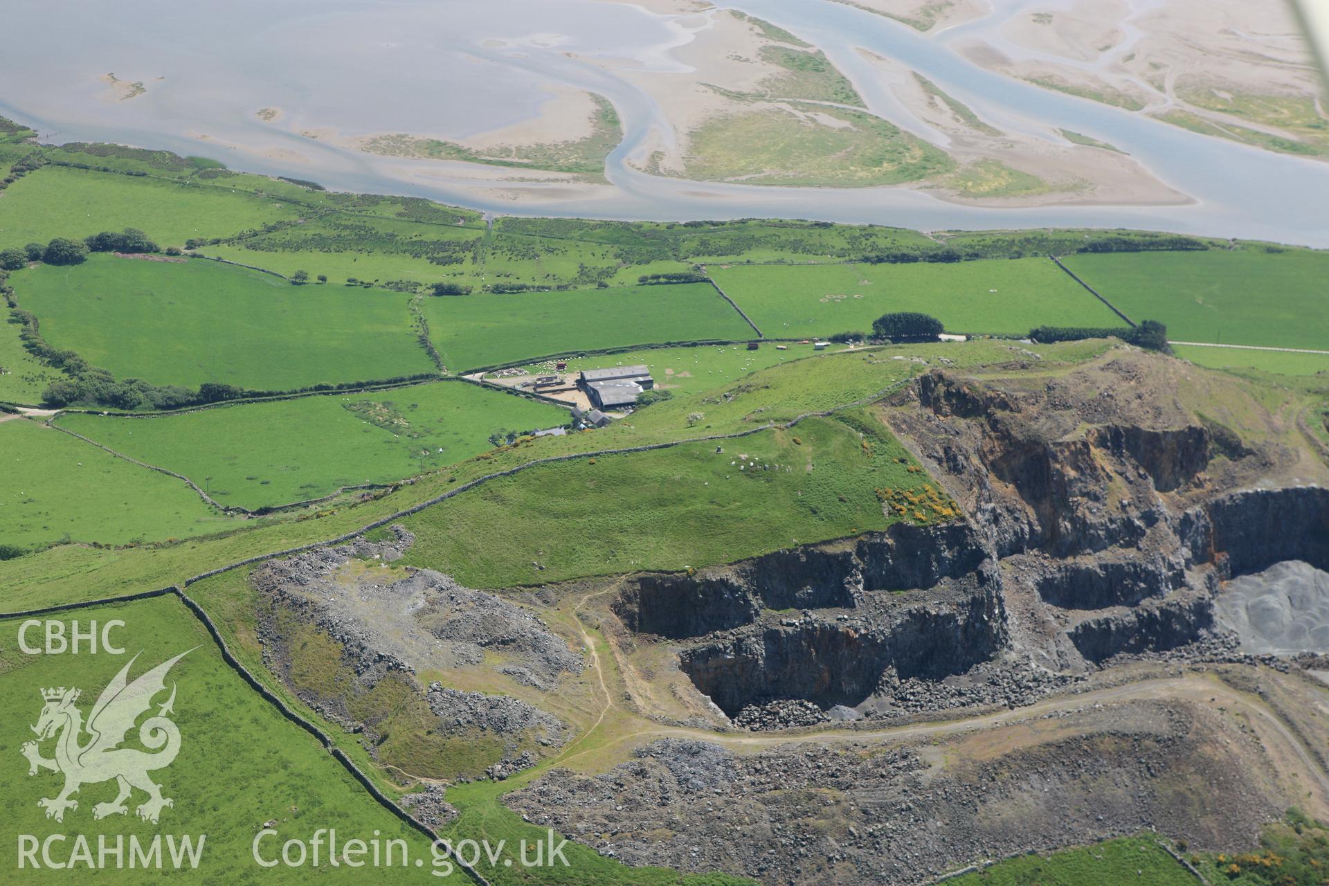 RCAHMW colour oblique aerial photograph of Tal-y-Gareg Hillfort. Taken on 02 June 2009 by Toby Driver