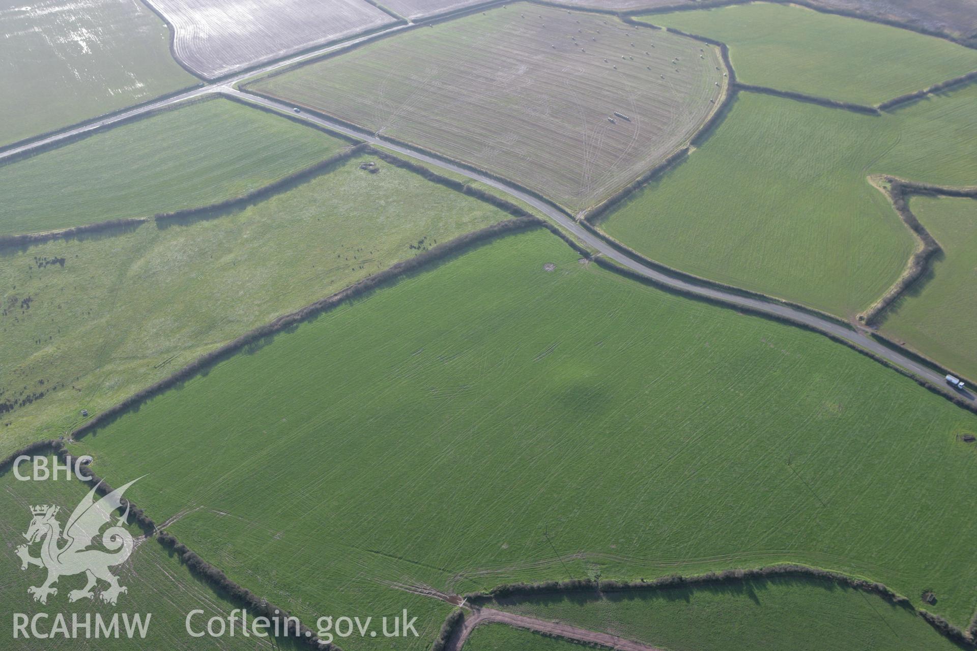 RCAHMW colour oblique aerial photograph of Wallaston Round Barrows I, II, III and IV. Taken on 28 January 2009 by Toby Driver