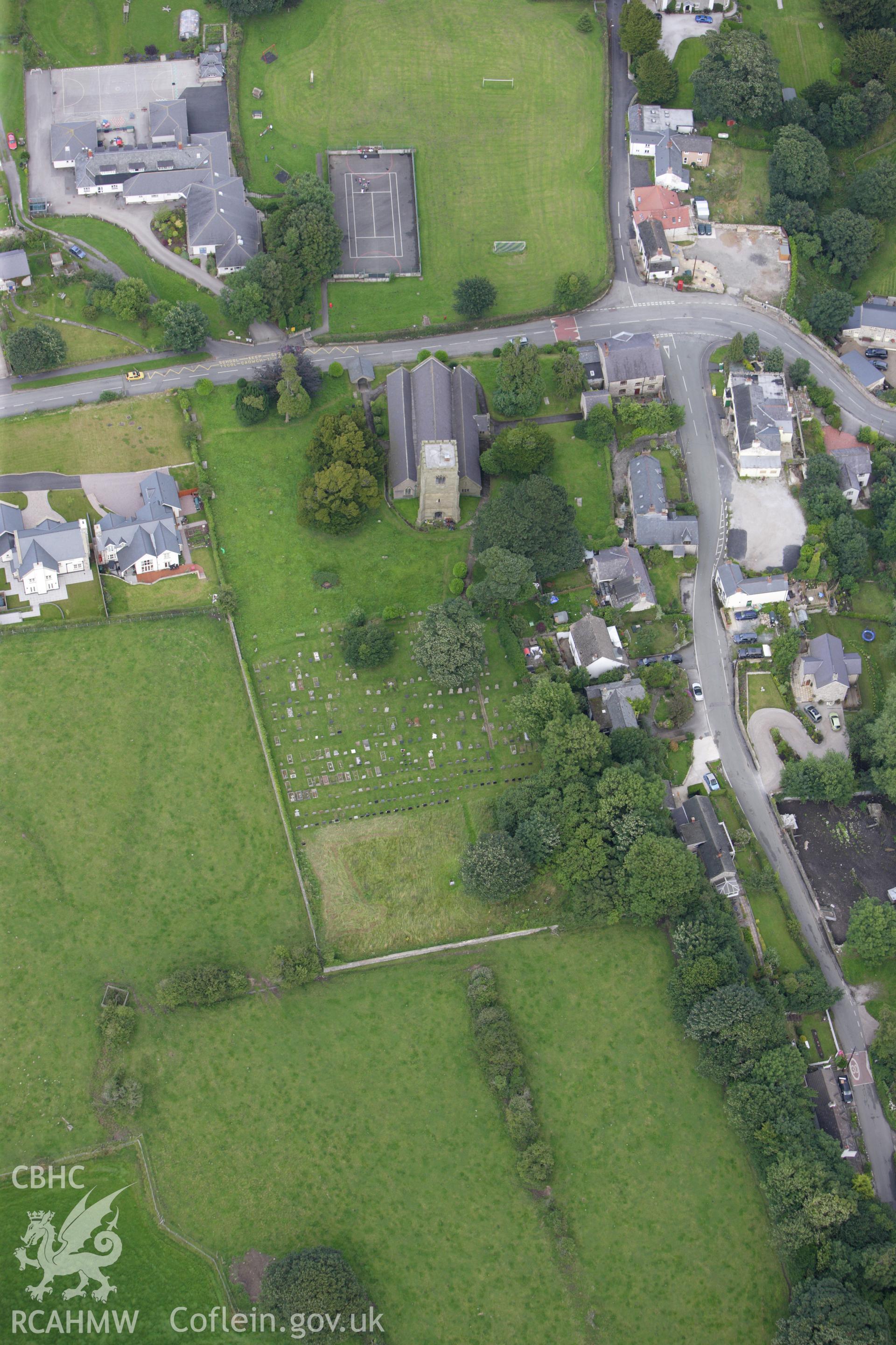 RCAHMW colour oblique aerial photograph of Downing Hall Inscribed Stone (now in Whitford Church). Taken on 30 July 2009 by Toby Driver