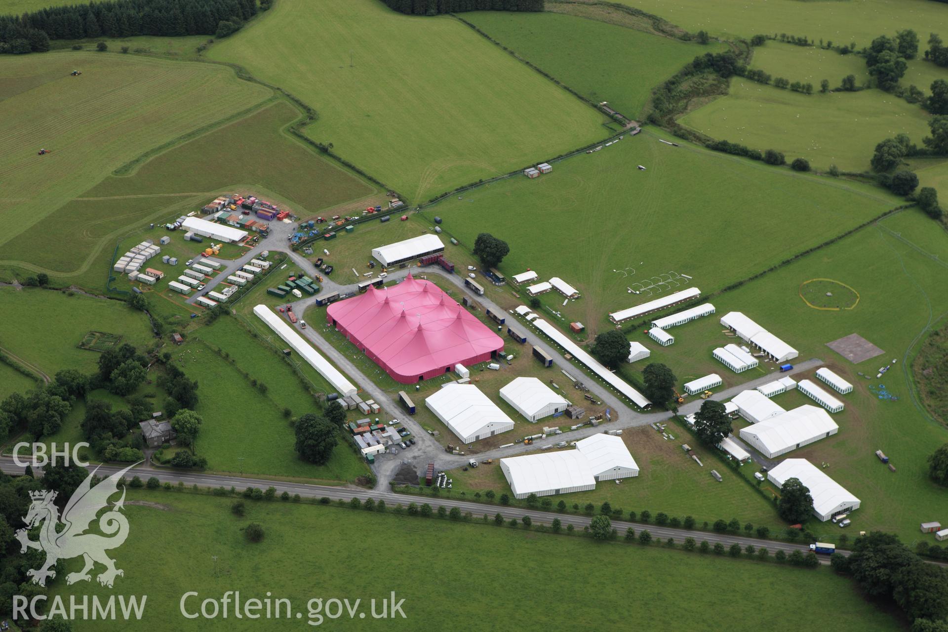 RCAHMW colour oblique aerial photograph of the site of the Eistedddfod at Bala in 1997 and 2009. Taken on 08 July 2009 by Toby Driver