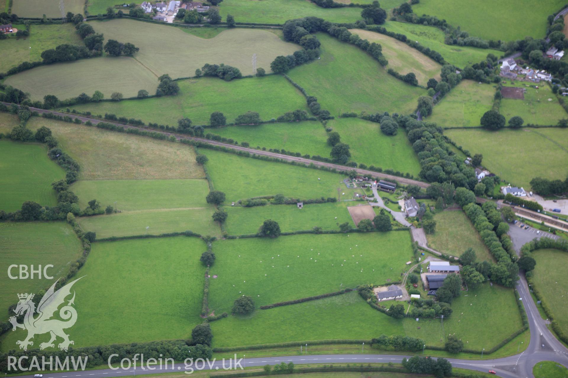 RCAHMW colour oblique aerial photograph of Wat's Dyke south of Rhos-y-Brwyner. Taken on 30 July 2009 by Toby Driver