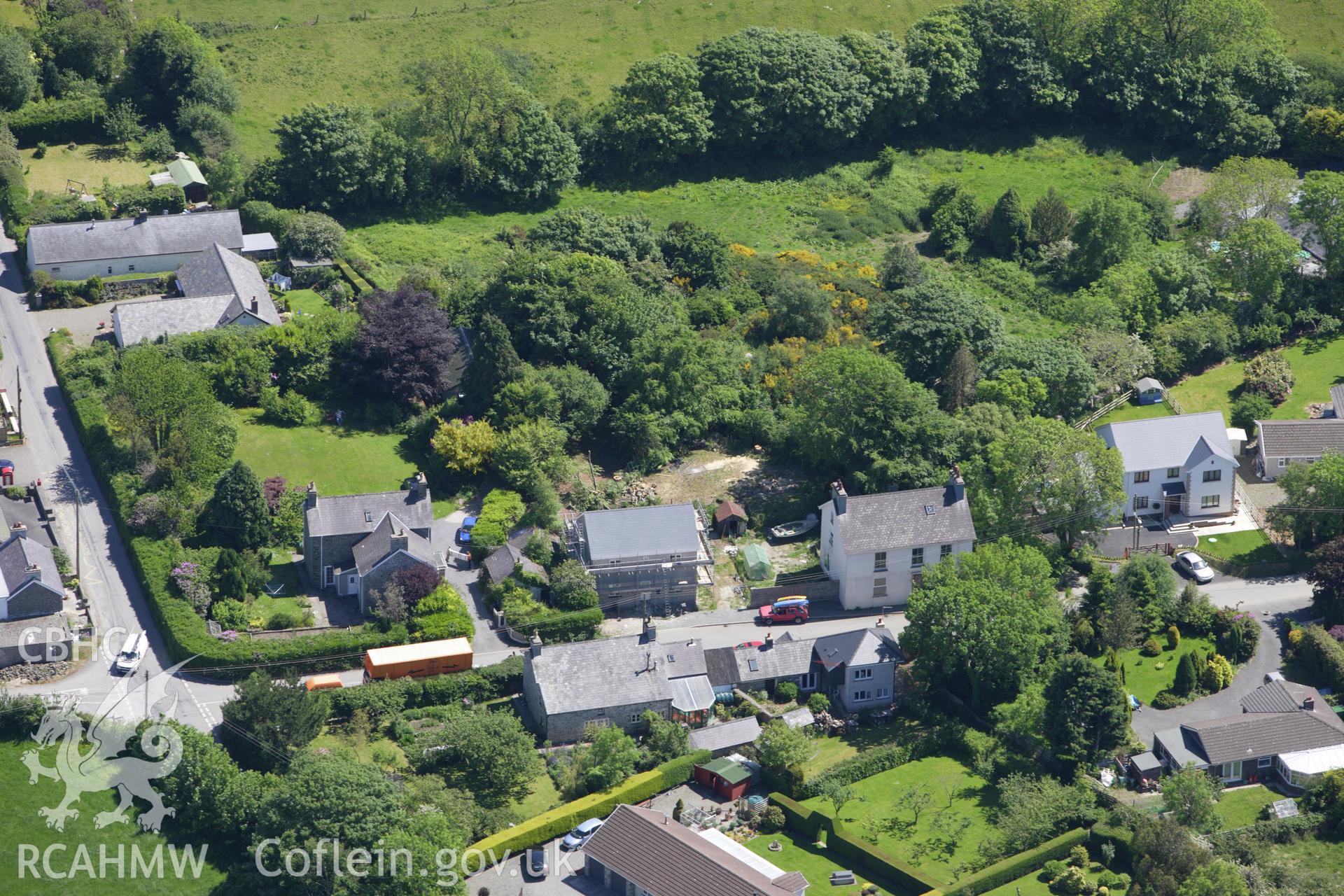 RCAHMW colour oblique aerial photograph of Castell Caerwedros. Taken on 01 June 2009 by Toby Driver