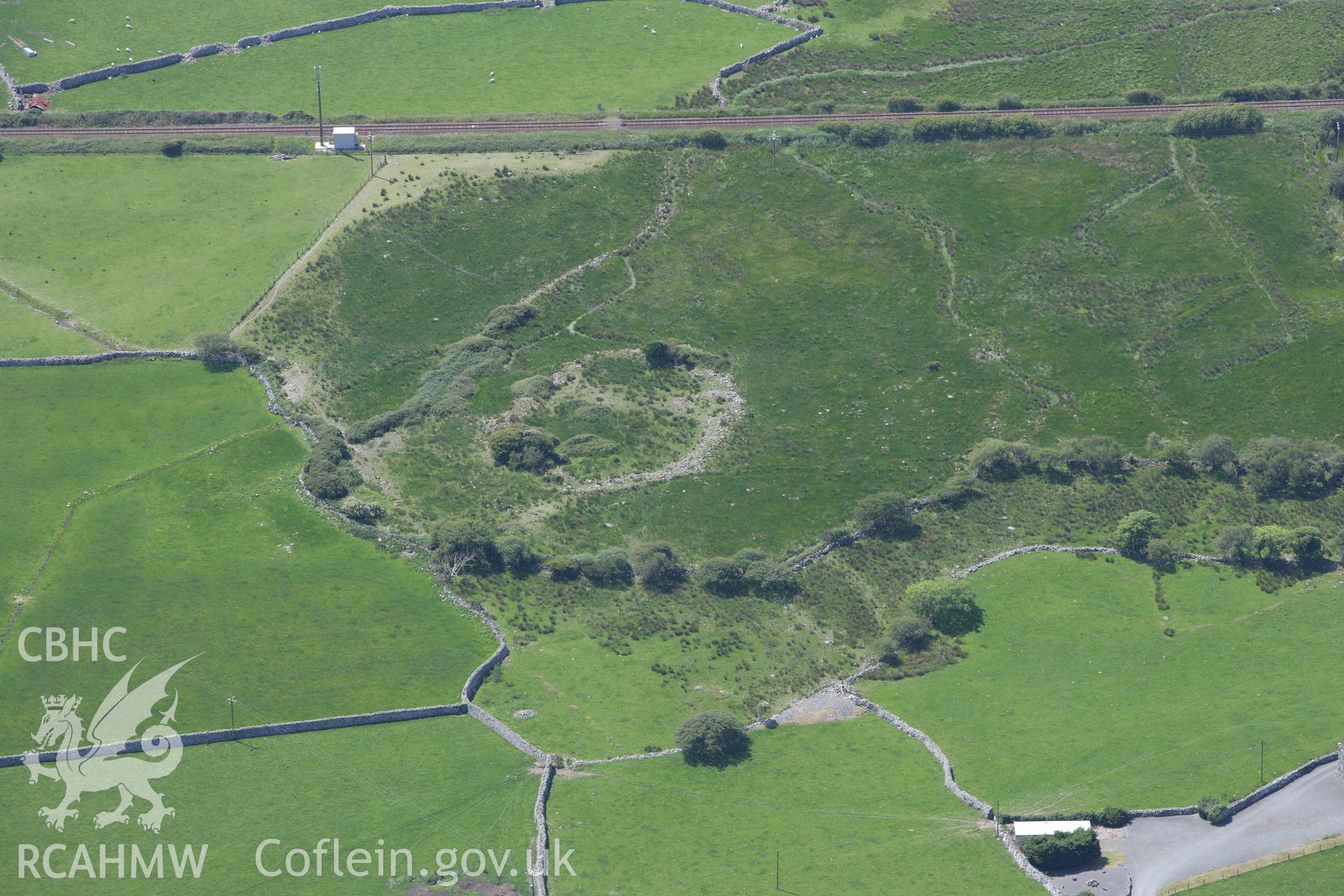 RCAHMW colour oblique aerial photograph of a homestead at Sebonig. Taken on 16 June 2009 by Toby Driver