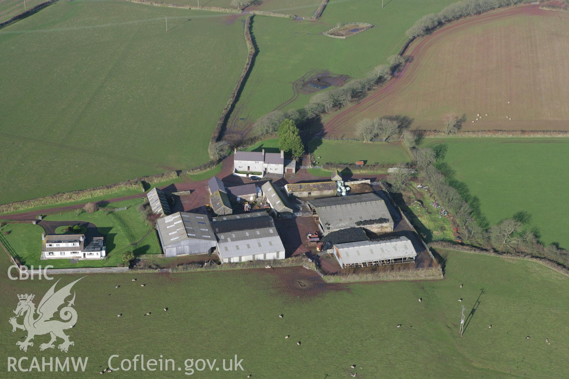 RCAHMW colour oblique aerial photograph of Kingston Farm Medieval Outbuilding, Pembroke. Taken on 28 January 2009 by Toby Driver