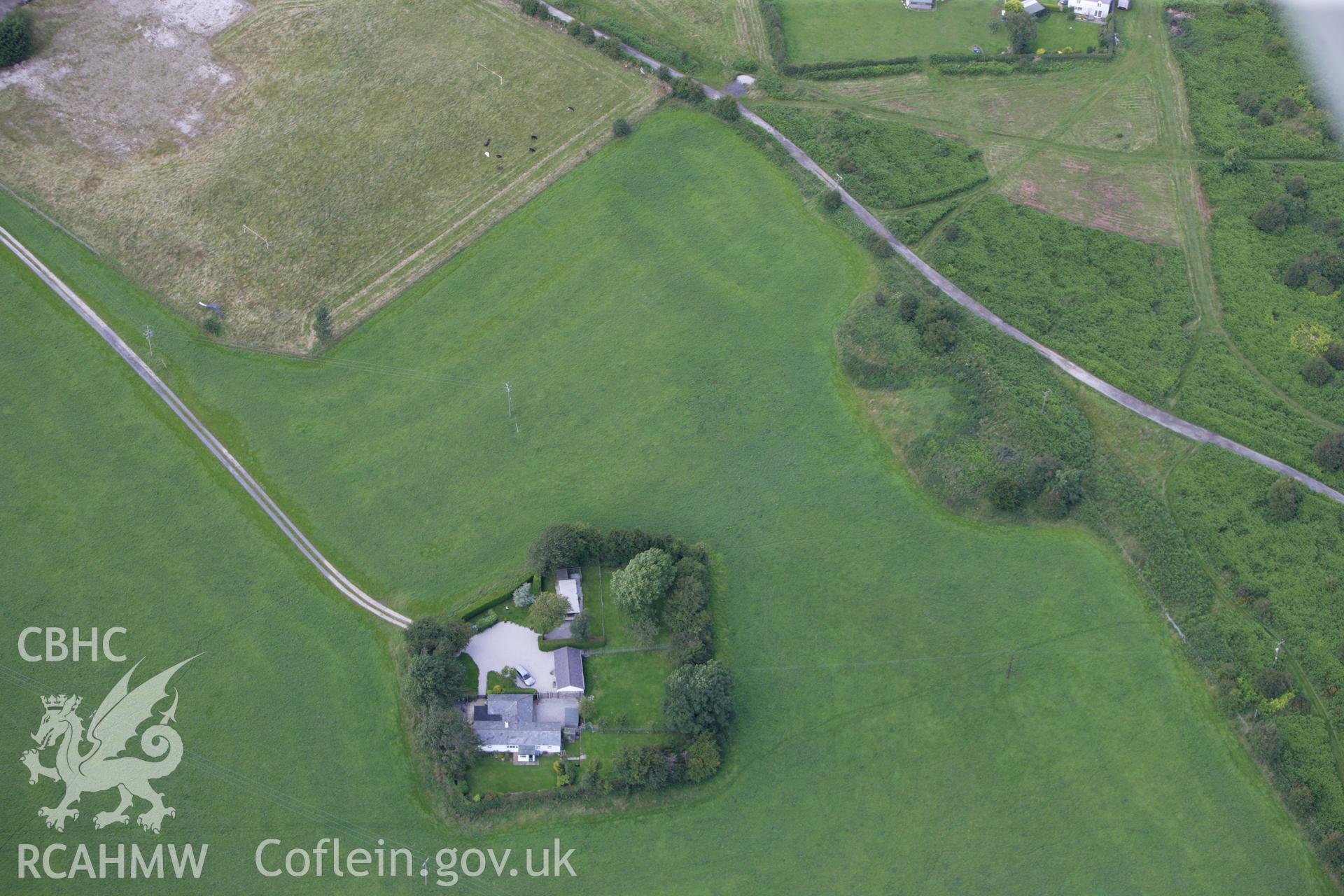 RCAHMW colour oblique aerial photograph of Eosfan Round Barrows A and B Taken on 30 July 2009 by Toby Driver