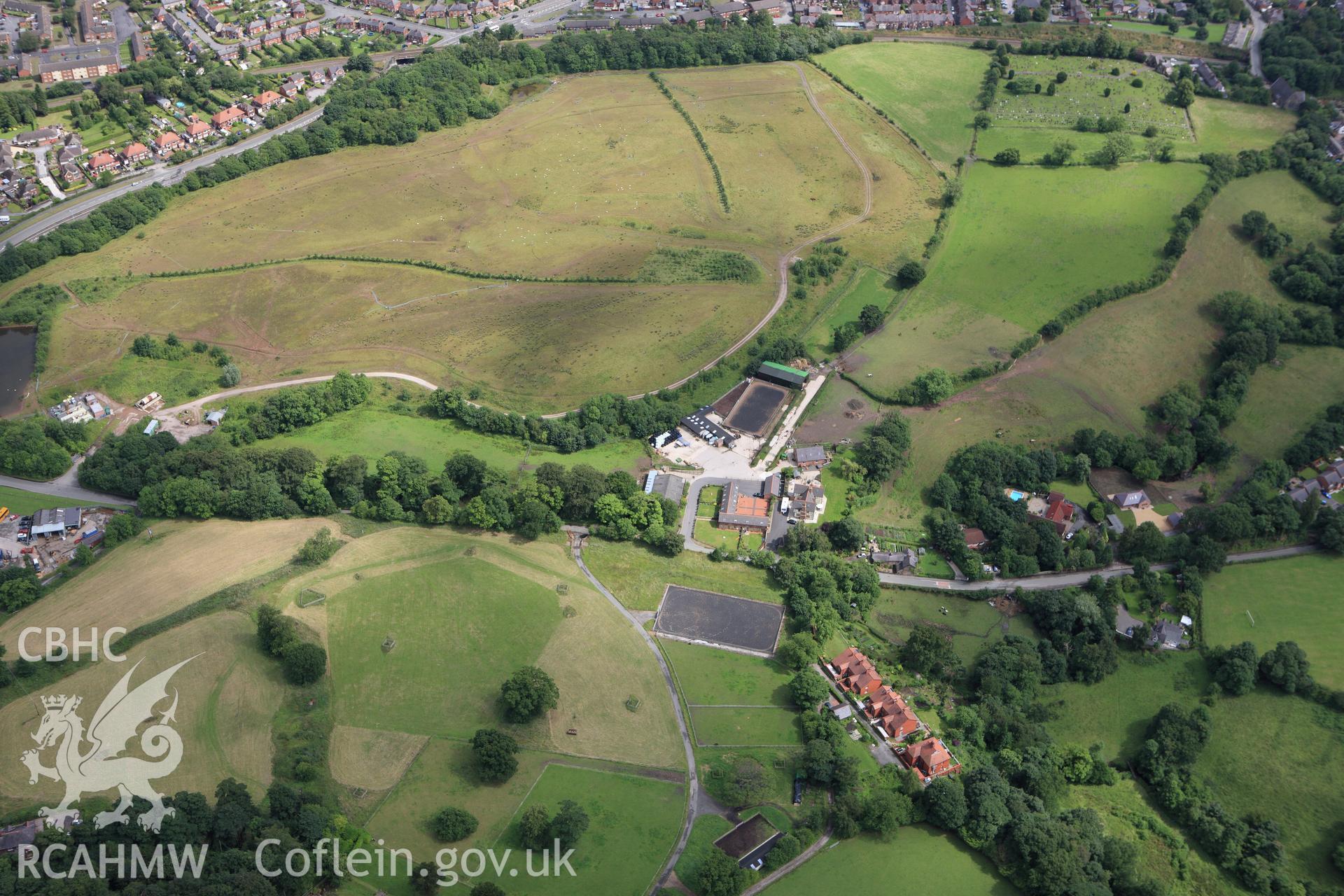 RCAHMW colour oblique aerial photograph of a section of Offa's Dyke at Y Gardden Camp. Taken on 08 July 2009 by Toby Driver