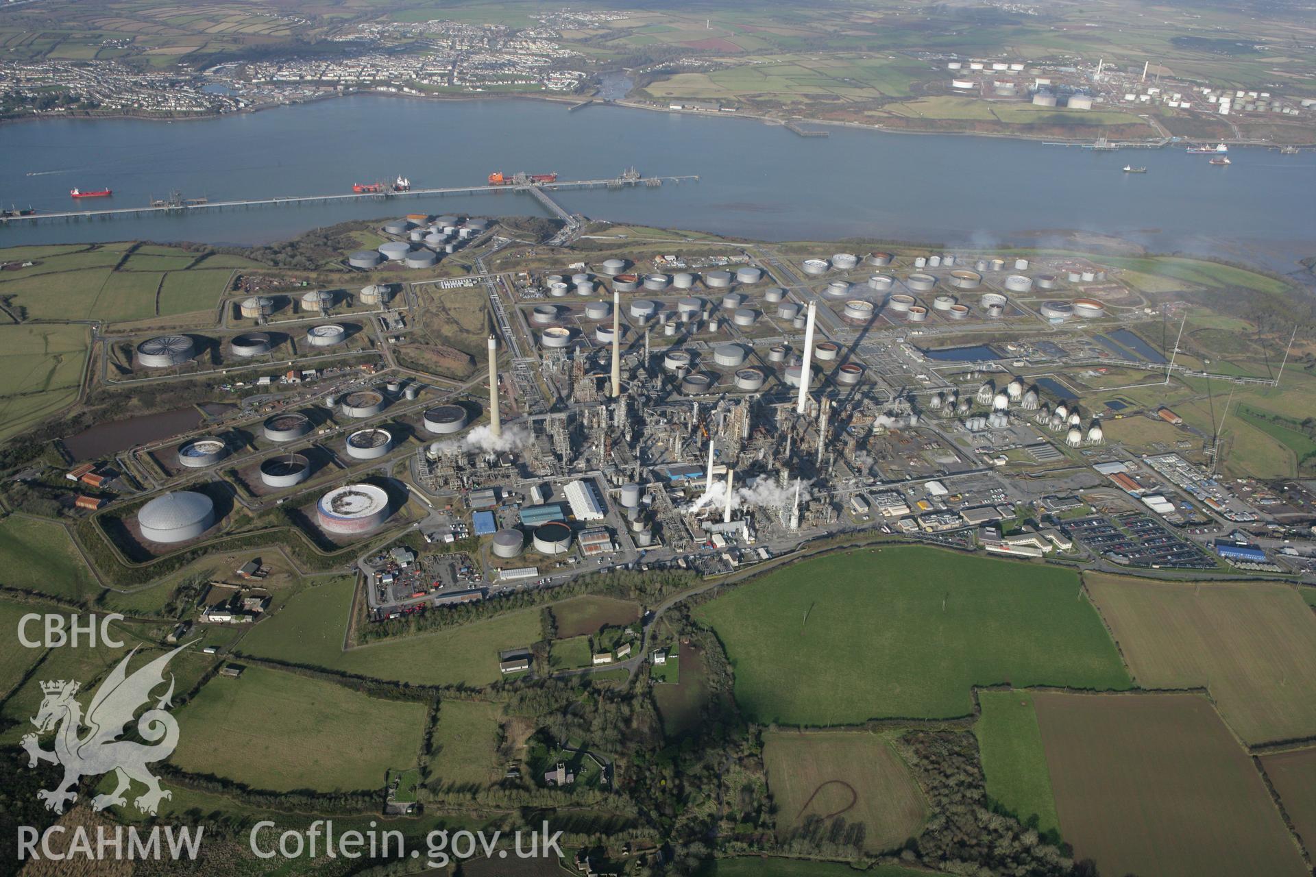 RCAHMW colour oblique photograph of Rhoscrowther oil refinery and storage facility. Taken by Toby Driver on 11/02/2009.