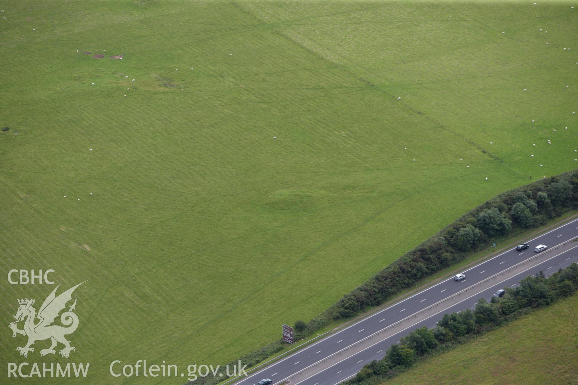 RCAHMW colour oblique aerial photograph of Ffrith-y-Garreg-Wen Barrow. Taken on 30 July 2009 by Toby Driver