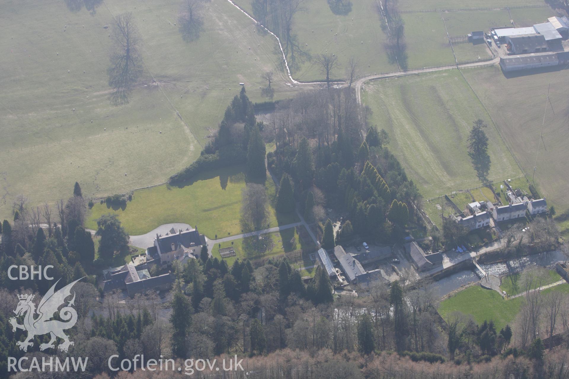 RCAHMW colour oblique photograph of Maesmor house, and Maesmor Hall Castle Mound. Taken by Toby Driver on 18/03/2009.