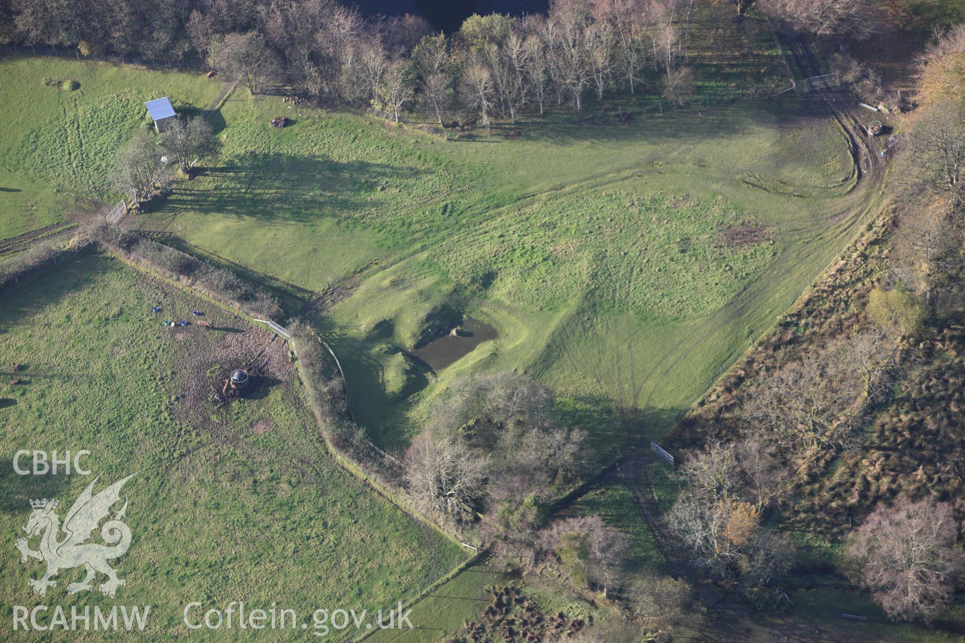 RCAHMW colour oblique aerial photograph of Llanio Roman Bathhouse. Taken on 09 November 2009 by Toby Driver