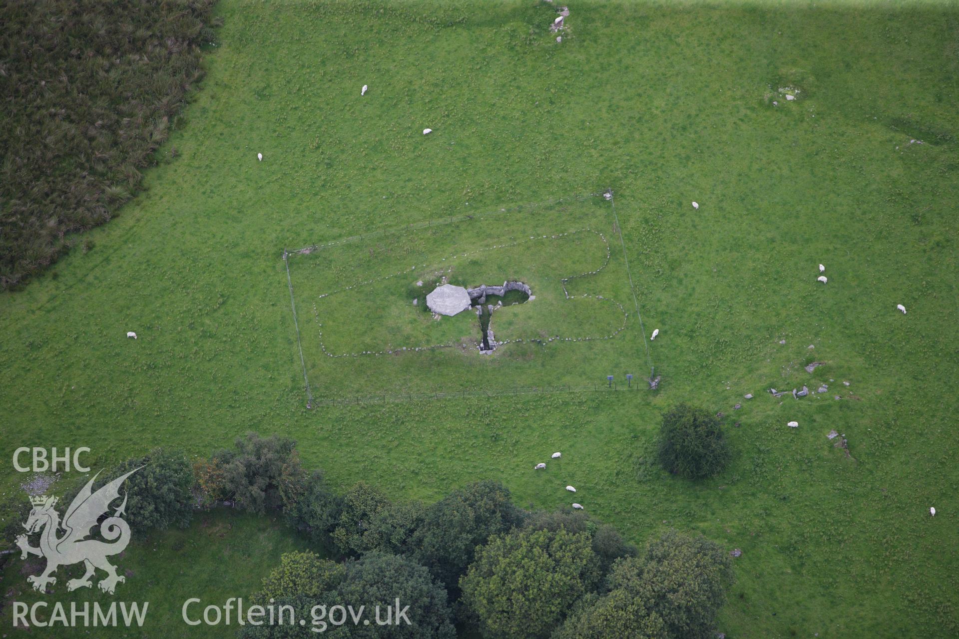 RCAHMW colour oblique aerial photograph of Capel Garmon Burial Chamber. Taken on 06 August 2009 by Toby Driver