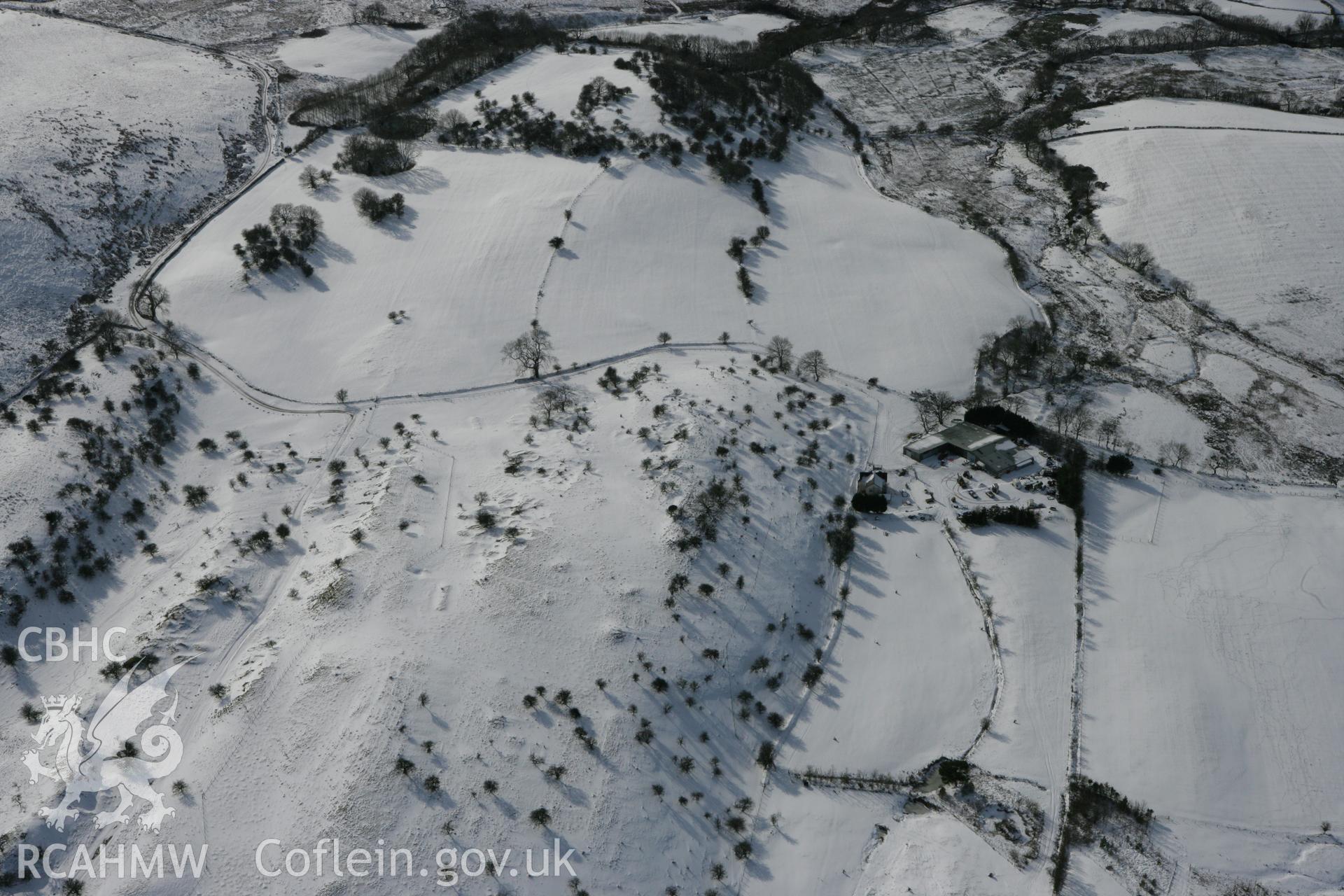 RCAHMW colour oblique photograph of Beddau'r Derwyddon pillow mounds. Taken by Toby Driver on 06/02/2009.