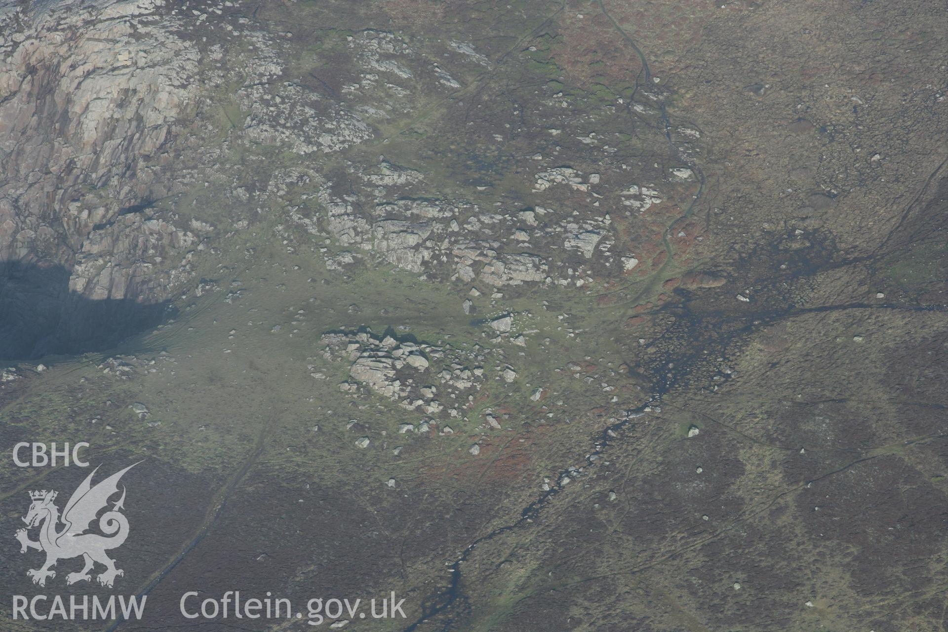 RCAHMW colour oblique aerial photograph of Coetan Arthur Burial Chamber, St David's Head. Taken on 28 January 2009 by Toby Driver