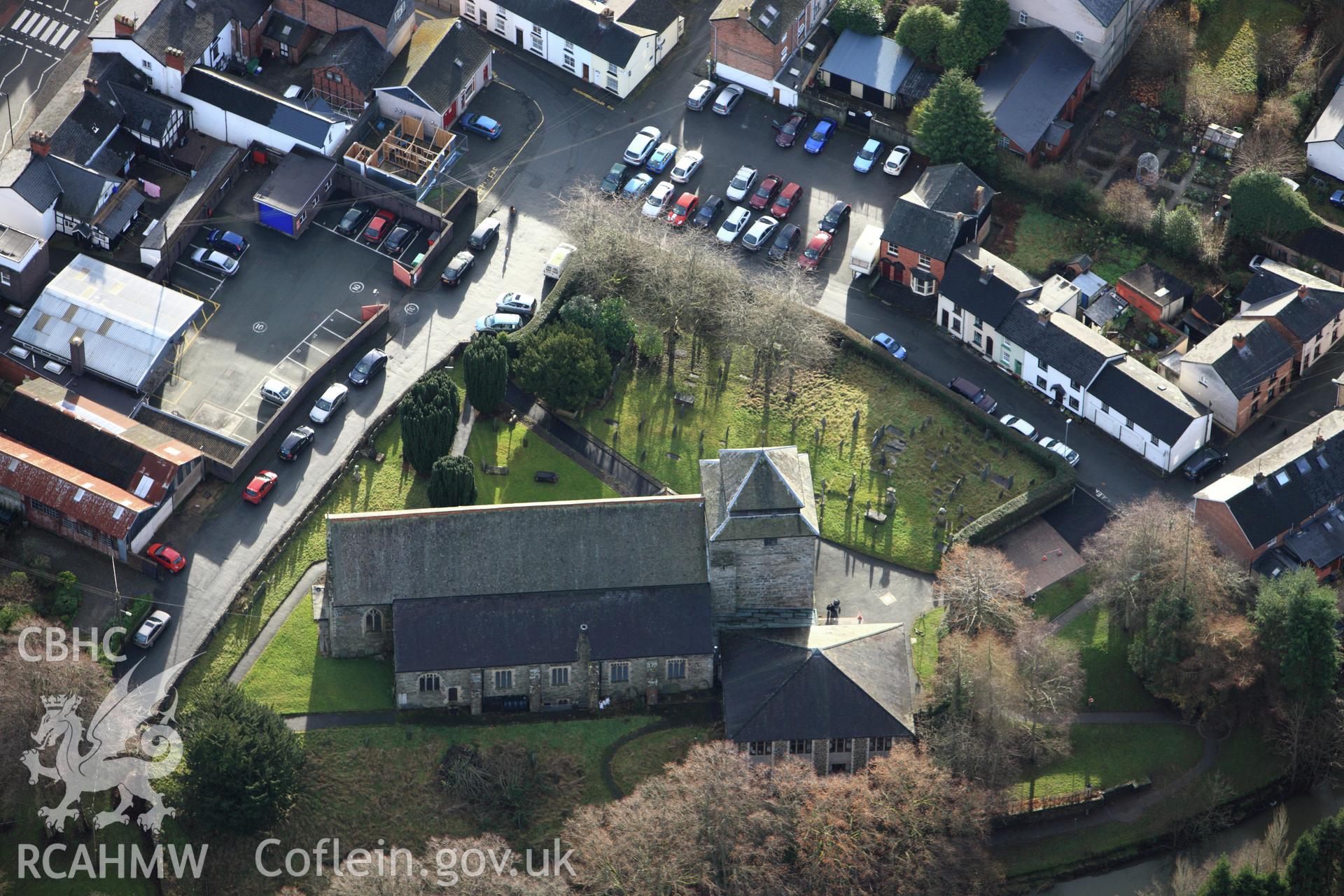 RCAHMW colour oblique aerial photograph of St Idloes' Church, Llanidloes. Taken on 10 December 2009 by Toby Driver