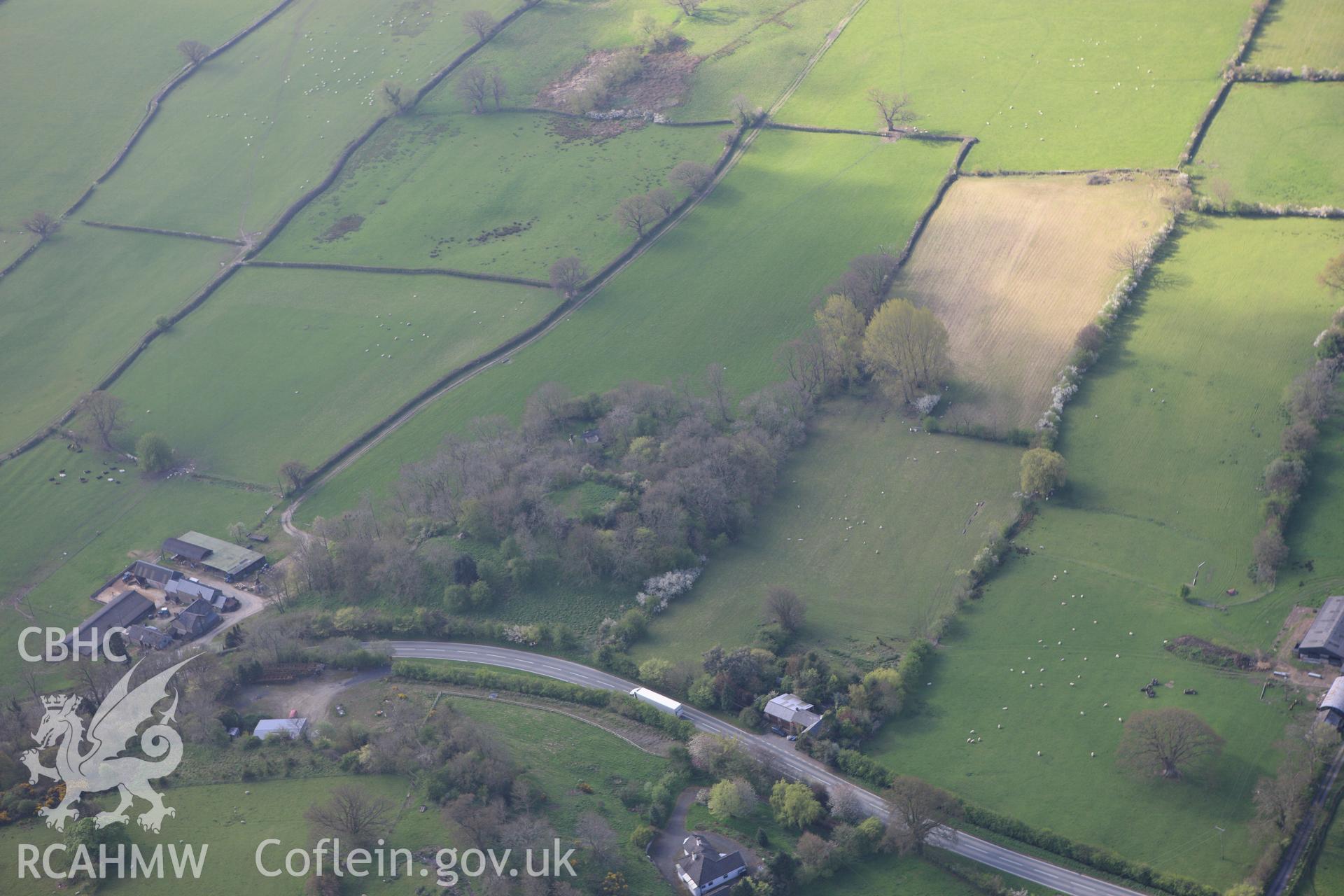 RCAHMW colour oblique aerial photograph of Simon's Castle. Taken on 21 April 2009 by Toby Driver