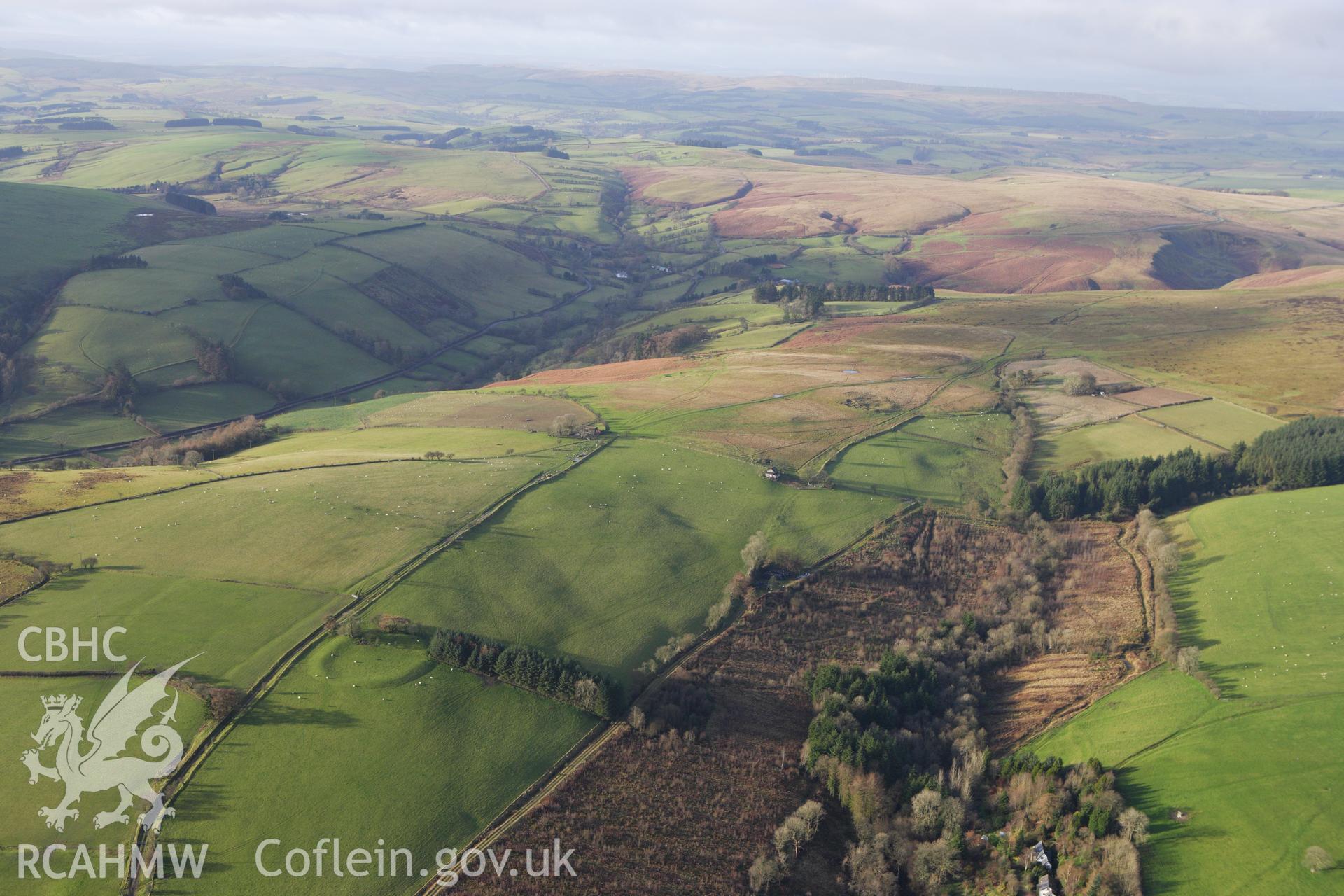 RCAHMW colour oblique aerial photograph of Llethrau Camp. Taken on 10 December 2009 by Toby Driver
