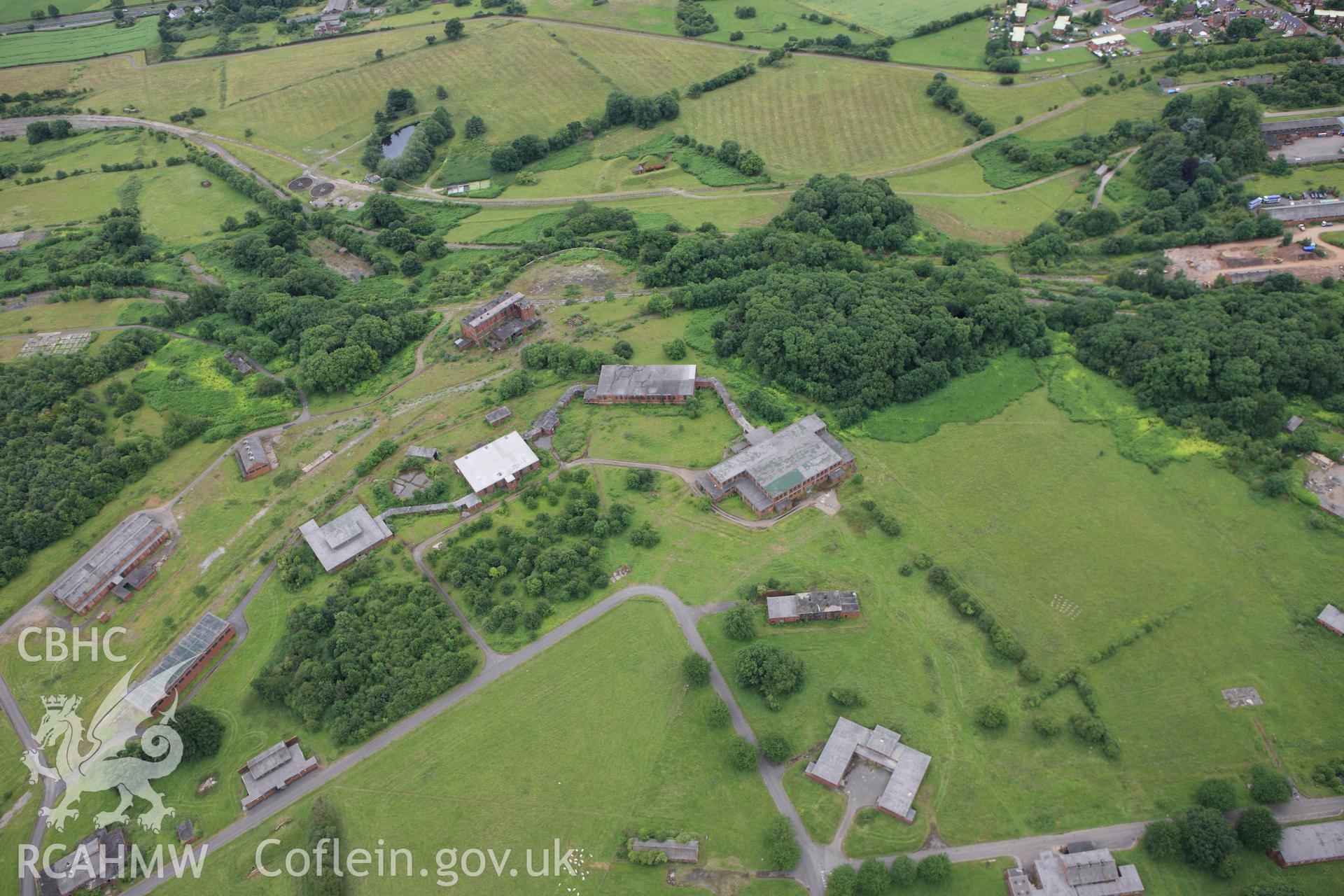 RCAHMW colour oblique aerial photograph of the site of a roman building at Whitewall Brake. Taken on 09 July 2009 by Toby Driver