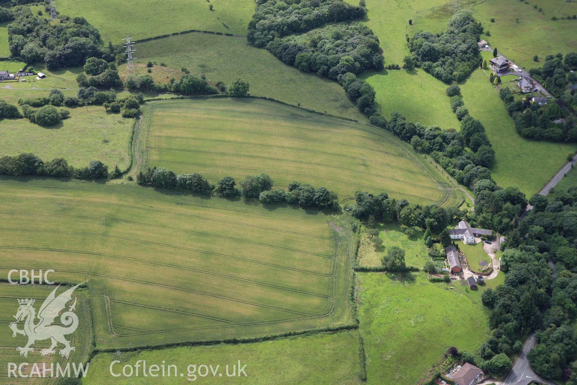 RCAHMW colour oblique aerial photograph of a section of Offa's Dyke south of Bryn Yr Owen Farm. Taken on 08 July 2009 by Toby Driver