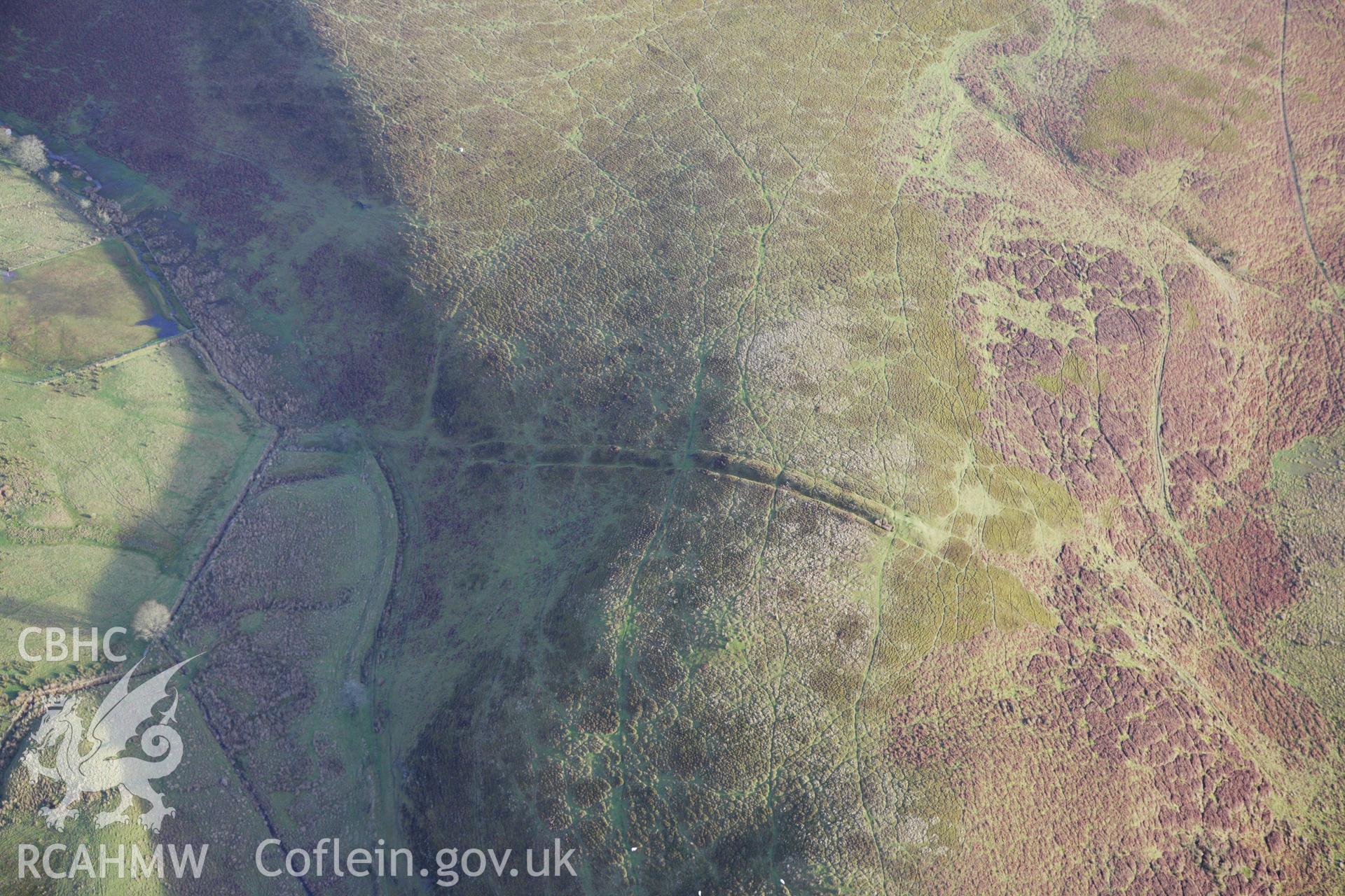 RCAHMW colour oblique aerial photograph of Two Tumps Dyke I. Taken on 10 December 2009 by Toby Driver