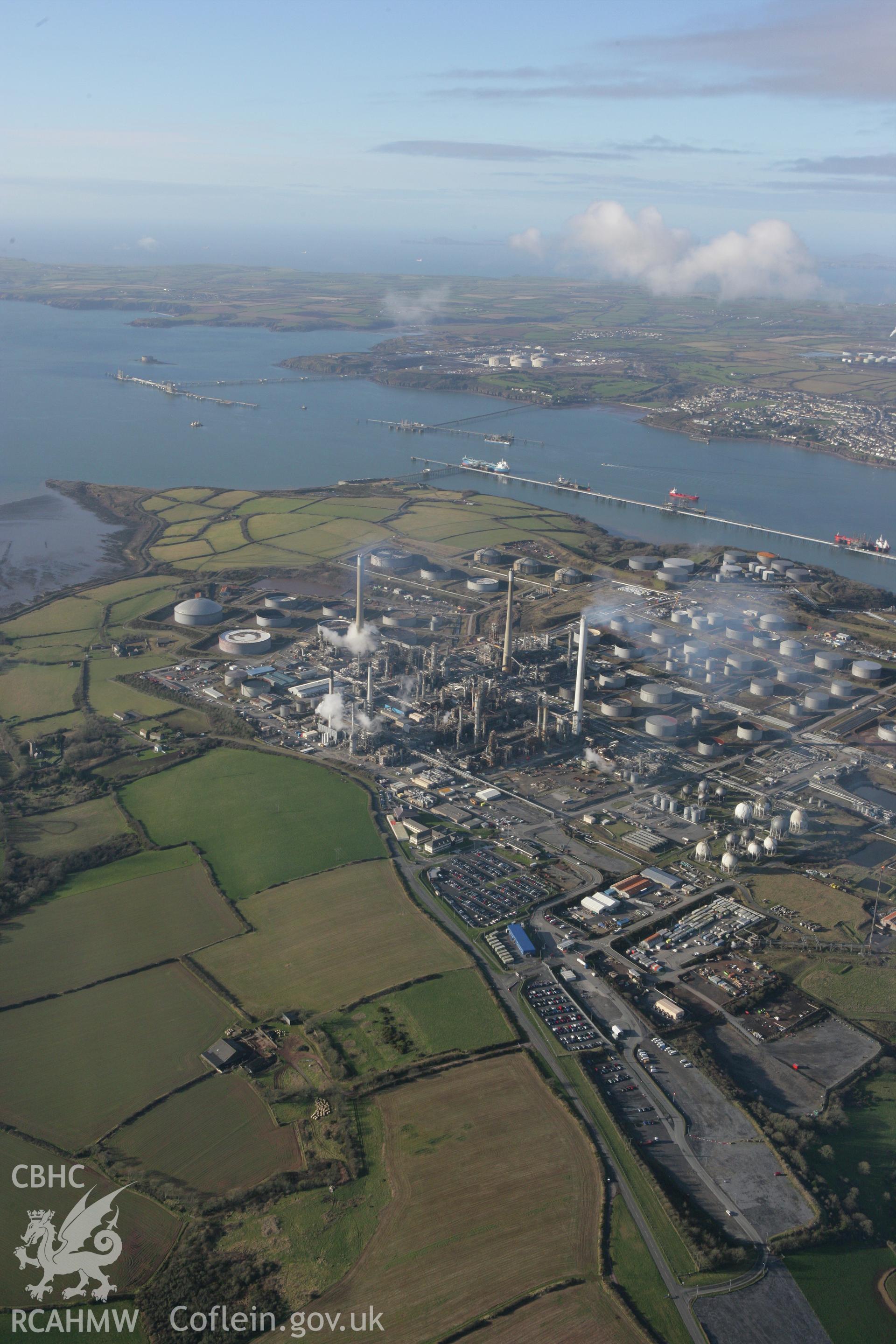 RCAHMW colour oblique photograph of Rhoscrowther oil refinery and storage facility. Taken by Toby Driver on 11/02/2009.