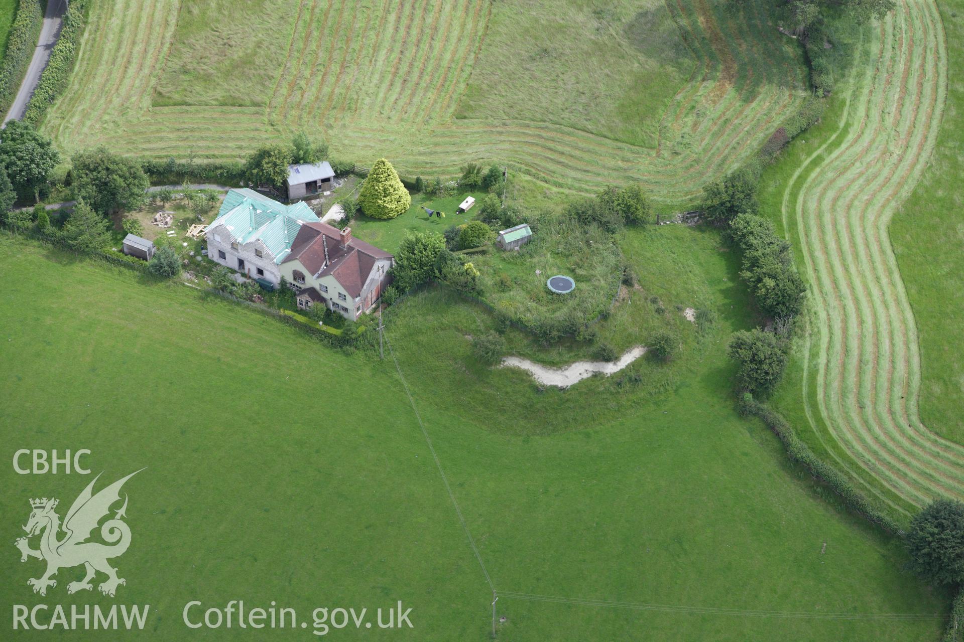 RCAHMW colour oblique aerial photograph of Tomen-Cefn Glaniwrch Motte. Taken on 08 July 2009 by Toby Driver