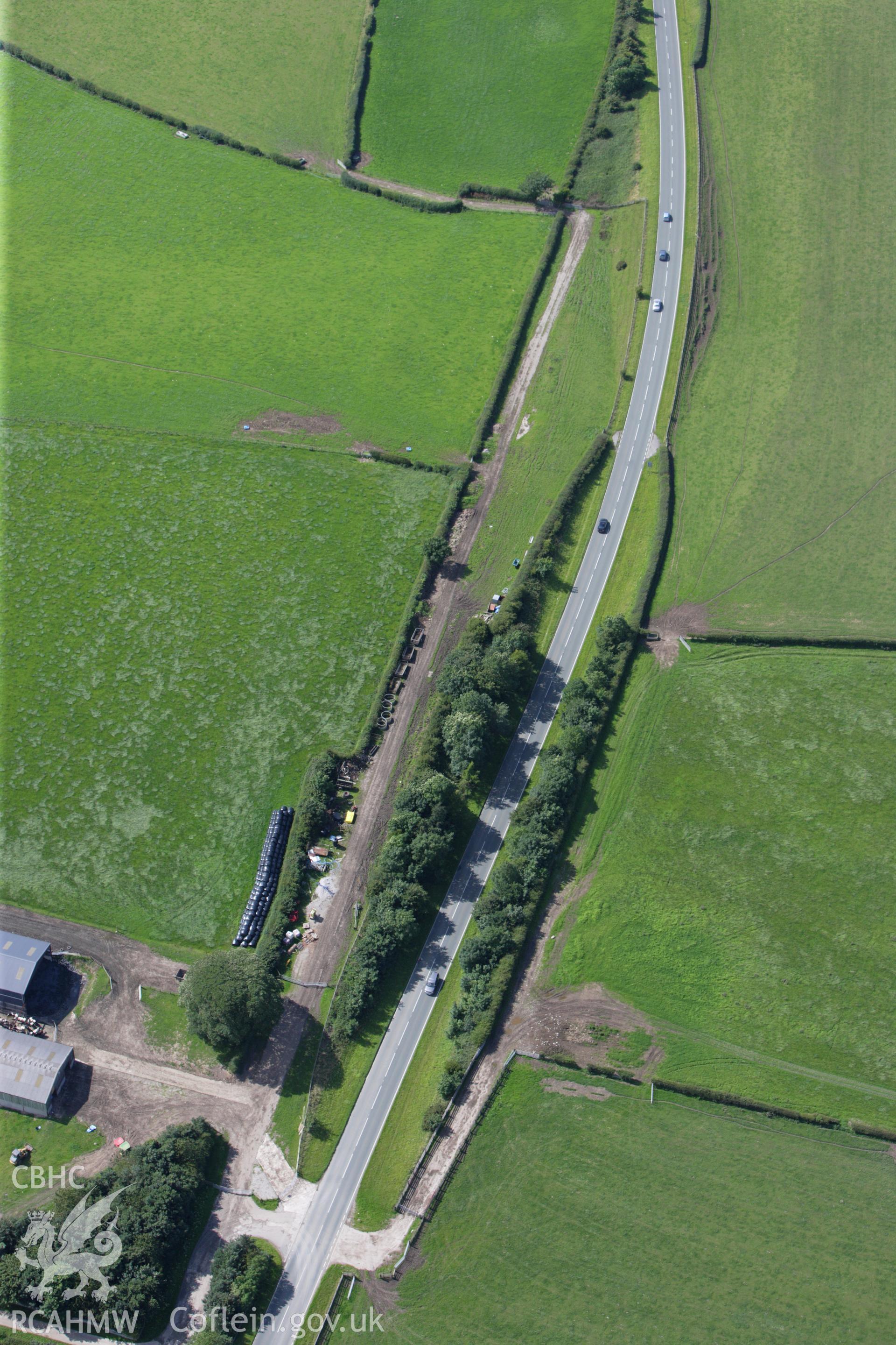 RCAHMW colour oblique aerial photograph of a section of Offa's Dyke or Whitford Dyke, northwest of Tre Abbot-Fawr. Taken on 30 July 2009 by Toby Driver