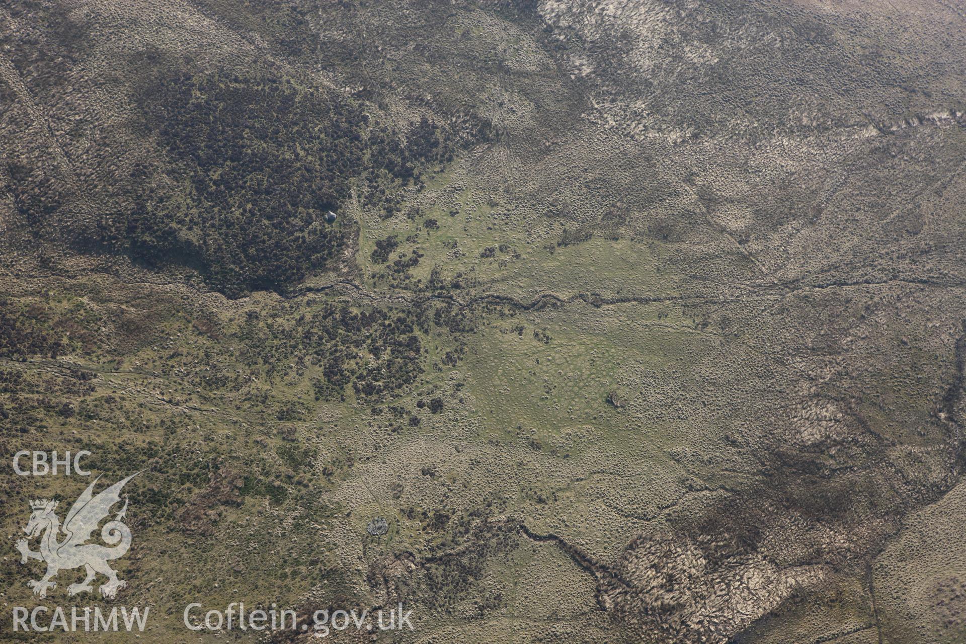 RCAHMW colour oblique photograph of Aber Llech Danie cairn. Taken by Toby Driver on 18/03/2009.