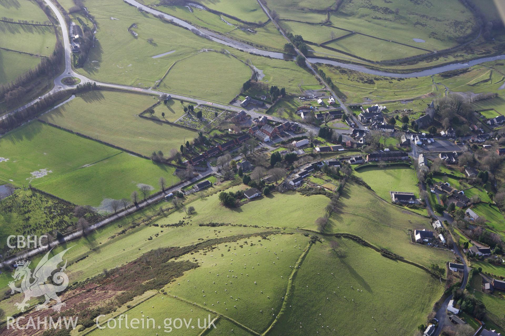 RCAHMW colour oblique aerial photograph of a section of the dismantled Manchester and Milford Railway between Llangurig and Llanidloes approaching Llangurig. Taken on 10 December 2009 by Toby Driver