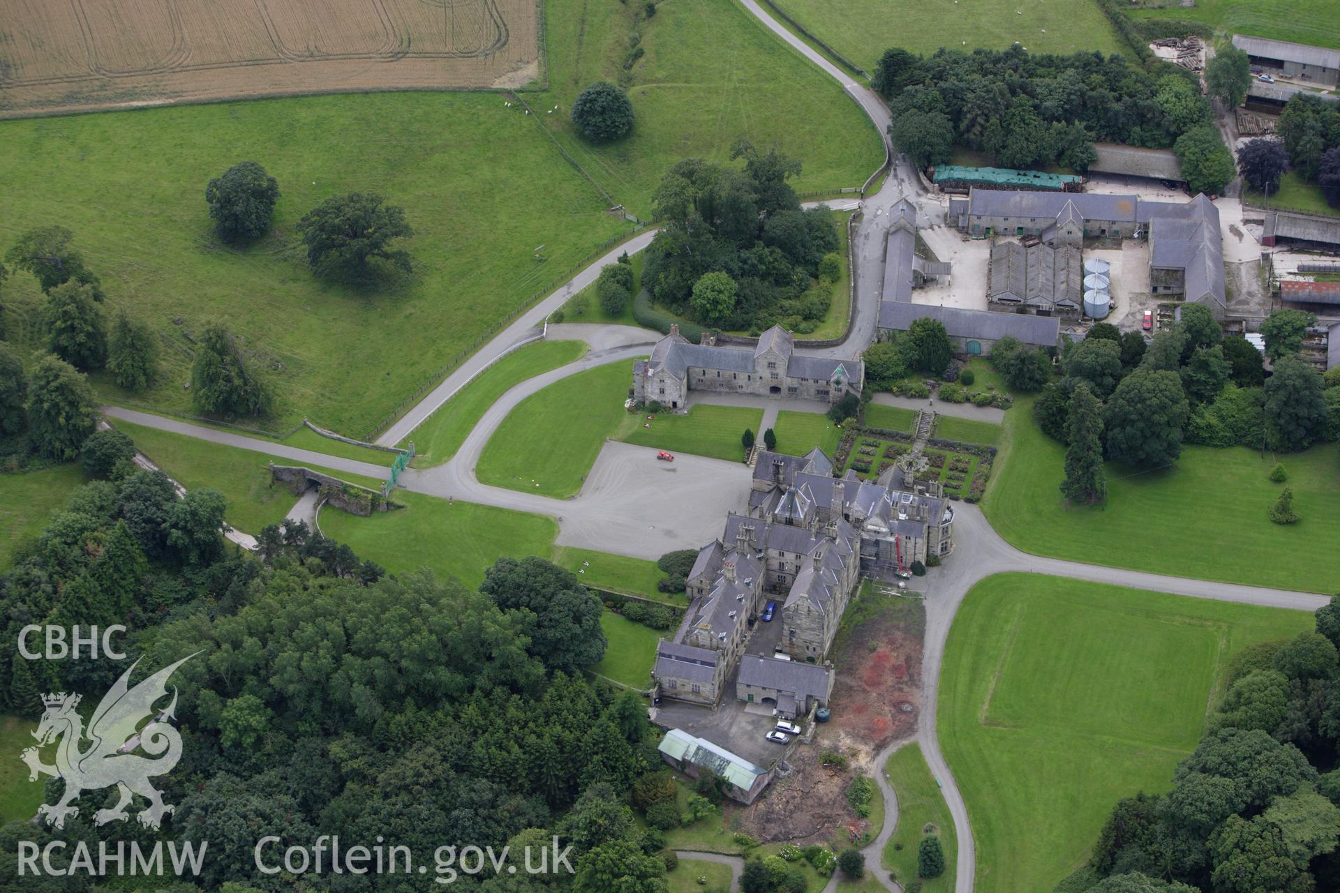 RCAHMW colour oblique aerial photograph of Mostyn Hall Main Block. Taken on 30 July 2009 by Toby Driver