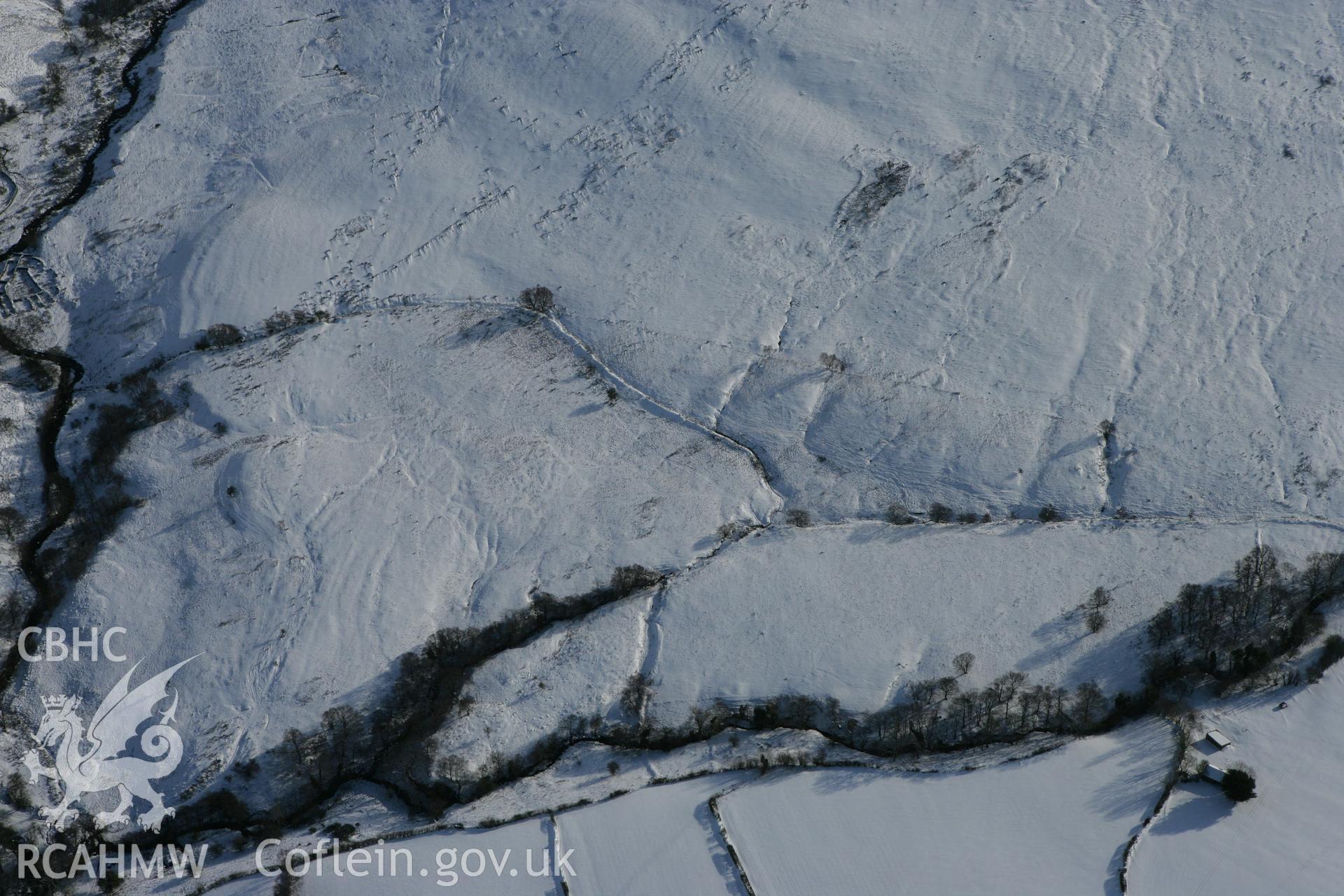 RCAHMW colour oblique photograph of Llwyn Wennol burnt mound. Taken by Toby Driver on 06/02/2009.