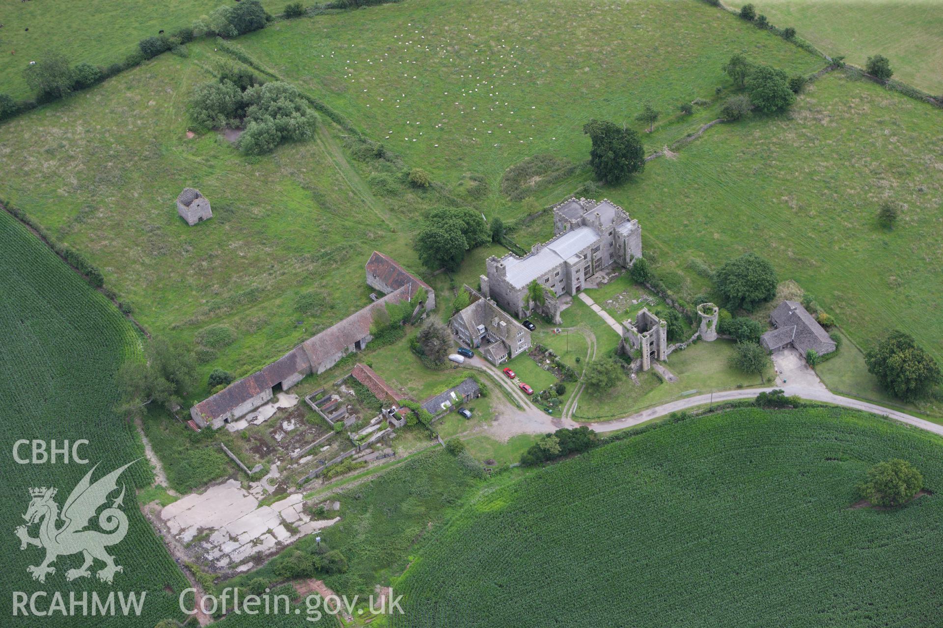 RCAHMW colour oblique aerial photograph of Pencoed Castle, Llanmartin. Taken on 09 July 2009 by Toby Driver