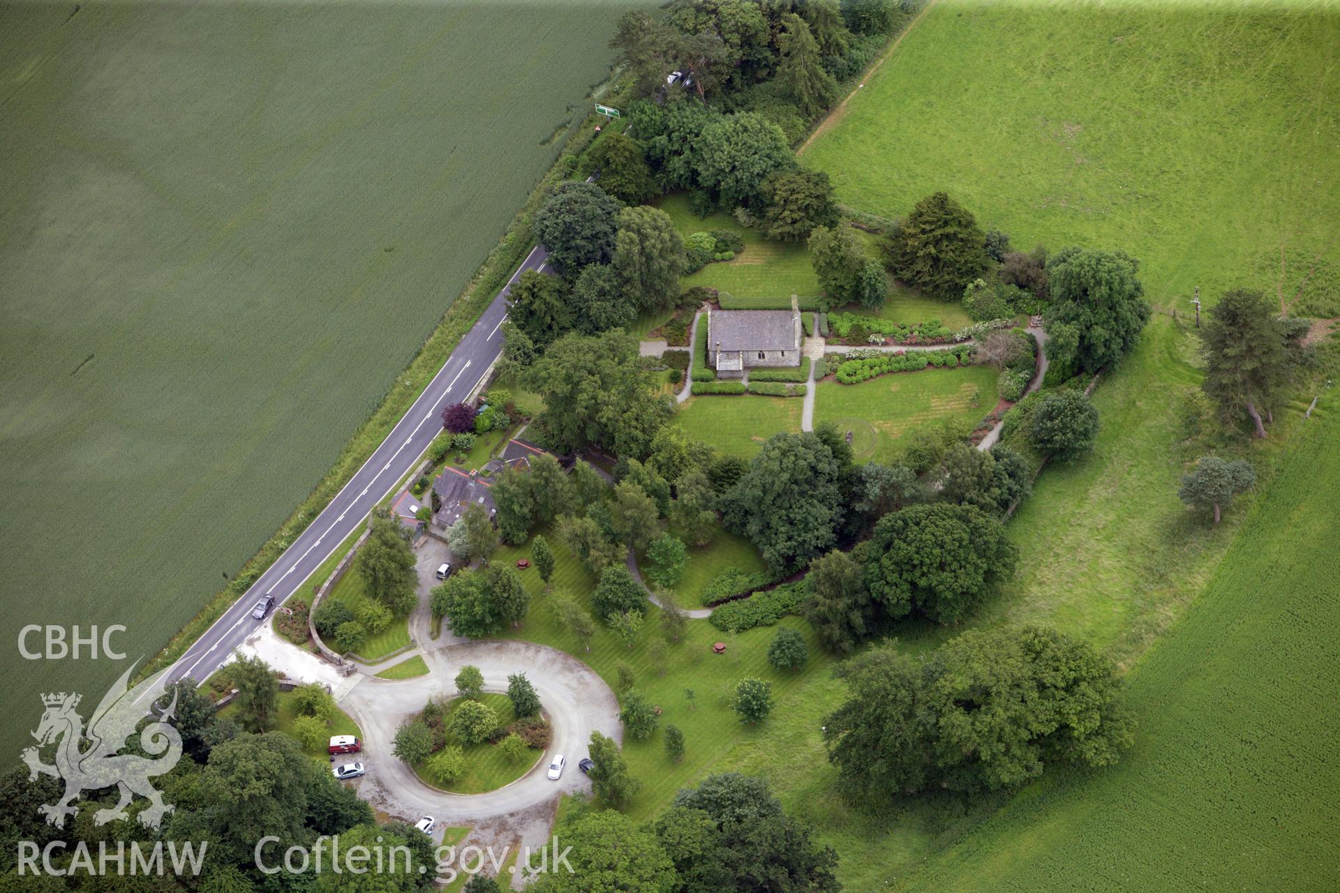 RCAHMW colour oblique aerial photograph of Holy Trinity Chapel (Rug Chapel), Dyffryn Edeirnion. Taken on 08 July 2009 by Toby Driver